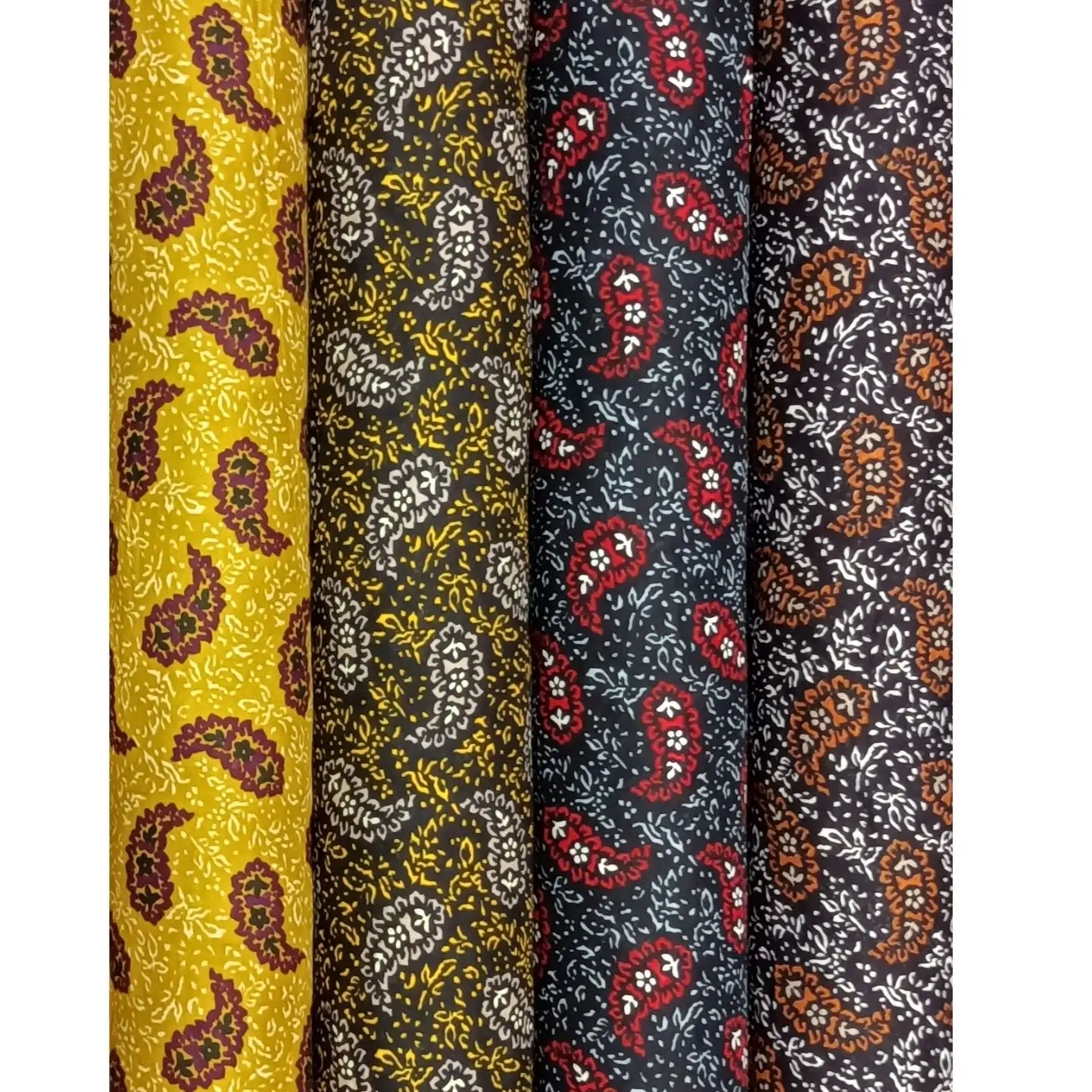 Geometric1 Collection, all colorways shown together. Classic teardrop paisley motifs are scattered across a dense field of fine scrolling leaves and tiny sprigs.