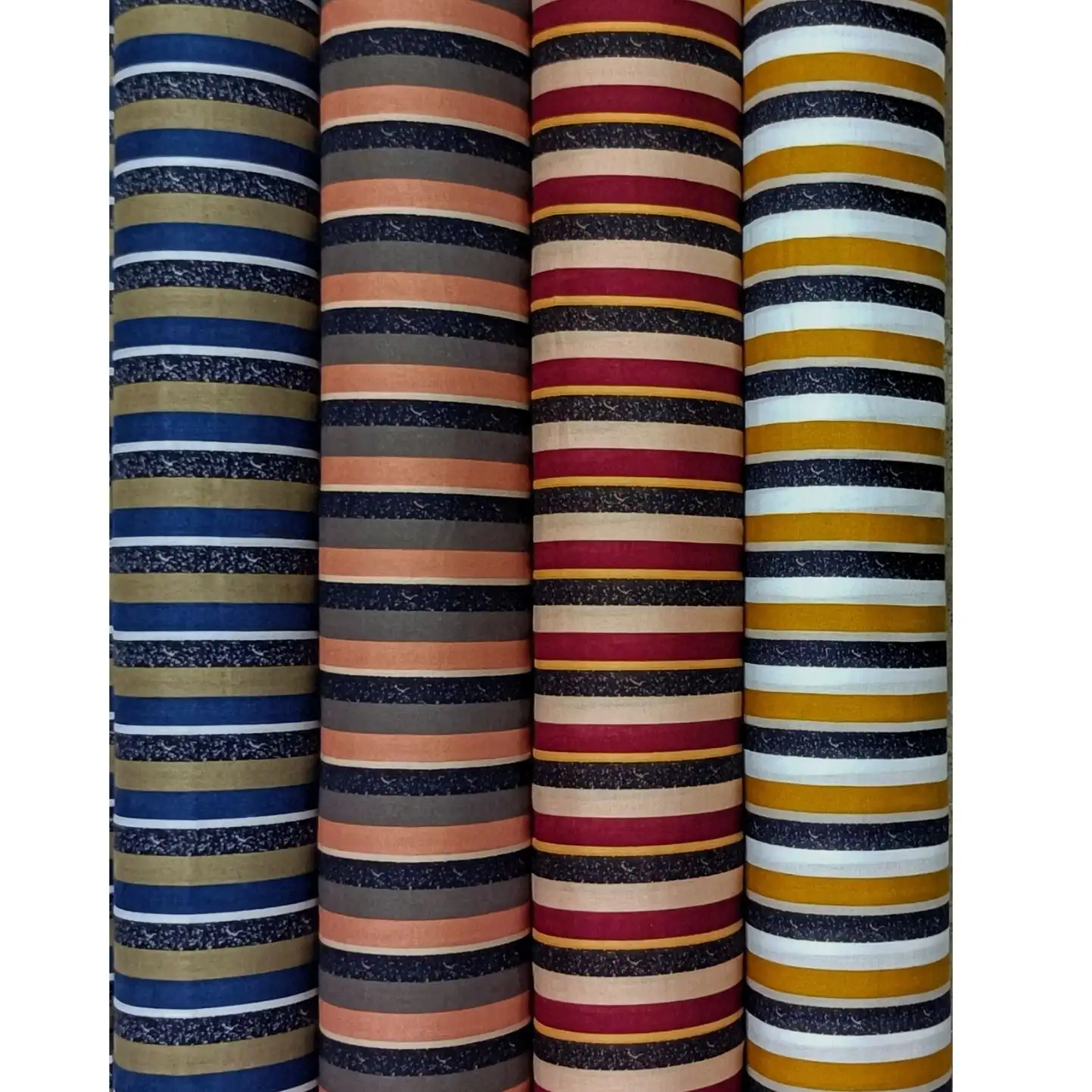 Stripes and Dots1 Collection, all colorways shown together. Evenly spaced horizontal stripes alternate solid bands with finely speckled, dotted ribbons across the cloth.