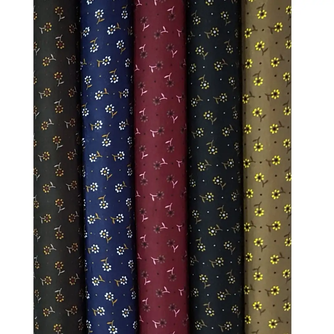 Floral5 Collection, all colorways shown together. Small five-petal daisy blossoms paired with tiny budded sprigs scatter in neat rows across the cloth.
