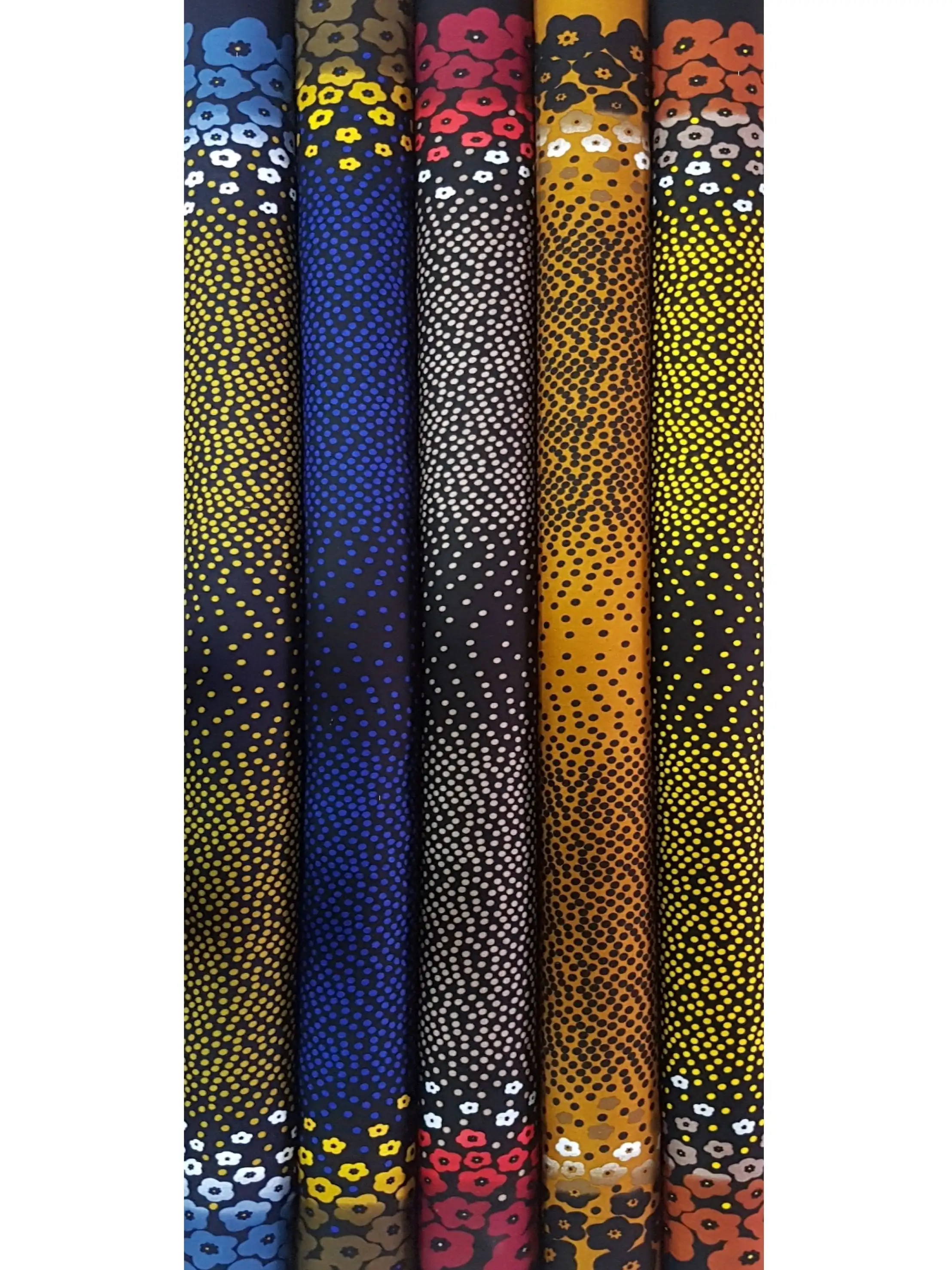 Floral14 Collection, all colorways shown together. Small clustered blossoms gather at the top and bottom edges while fields of scattered confetti dots fill the space between.
