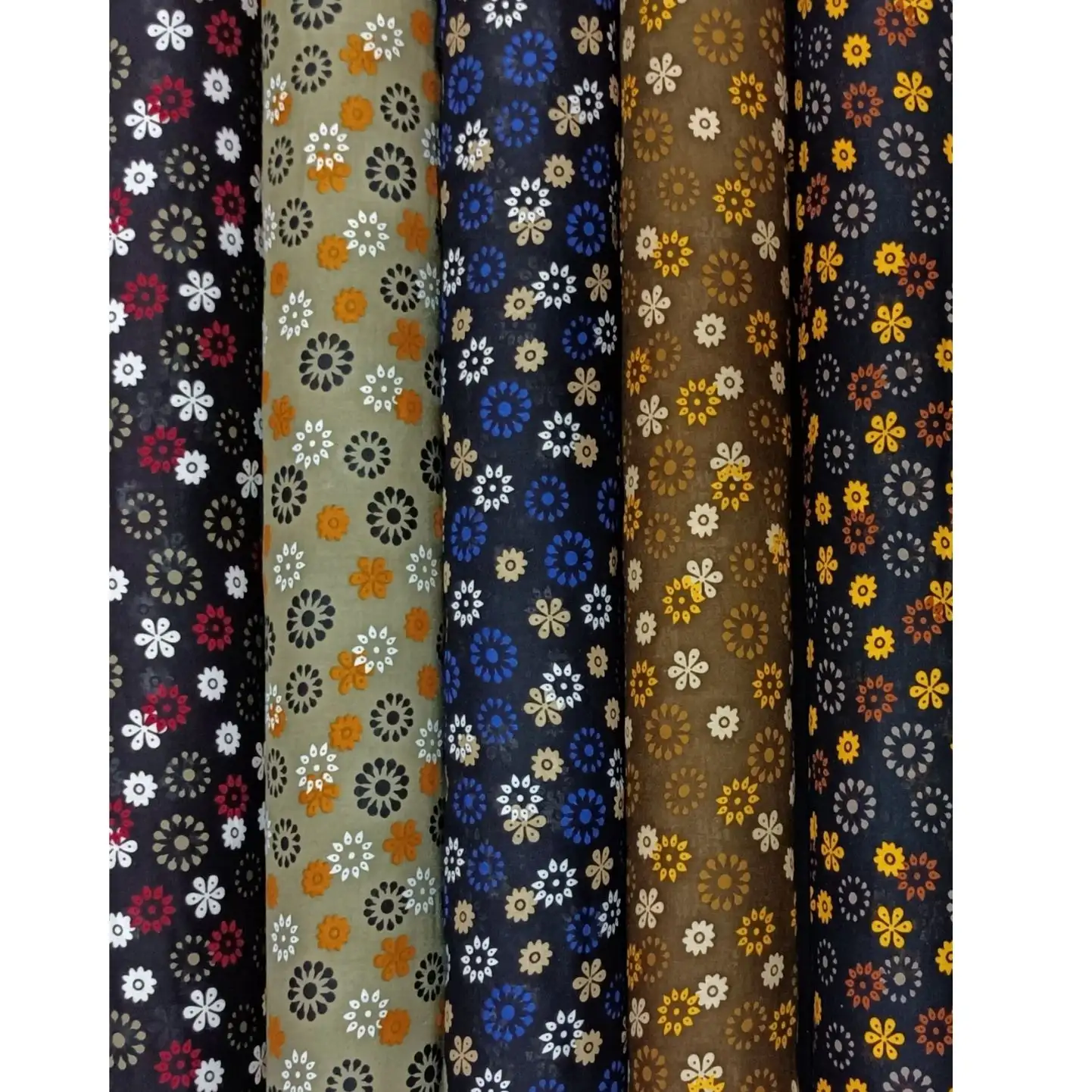 Floral2 Collection, all colorways shown together. Small daisy-like flowers and starburst blooms scatter densely across the fabric in a packed allover ditsy print.