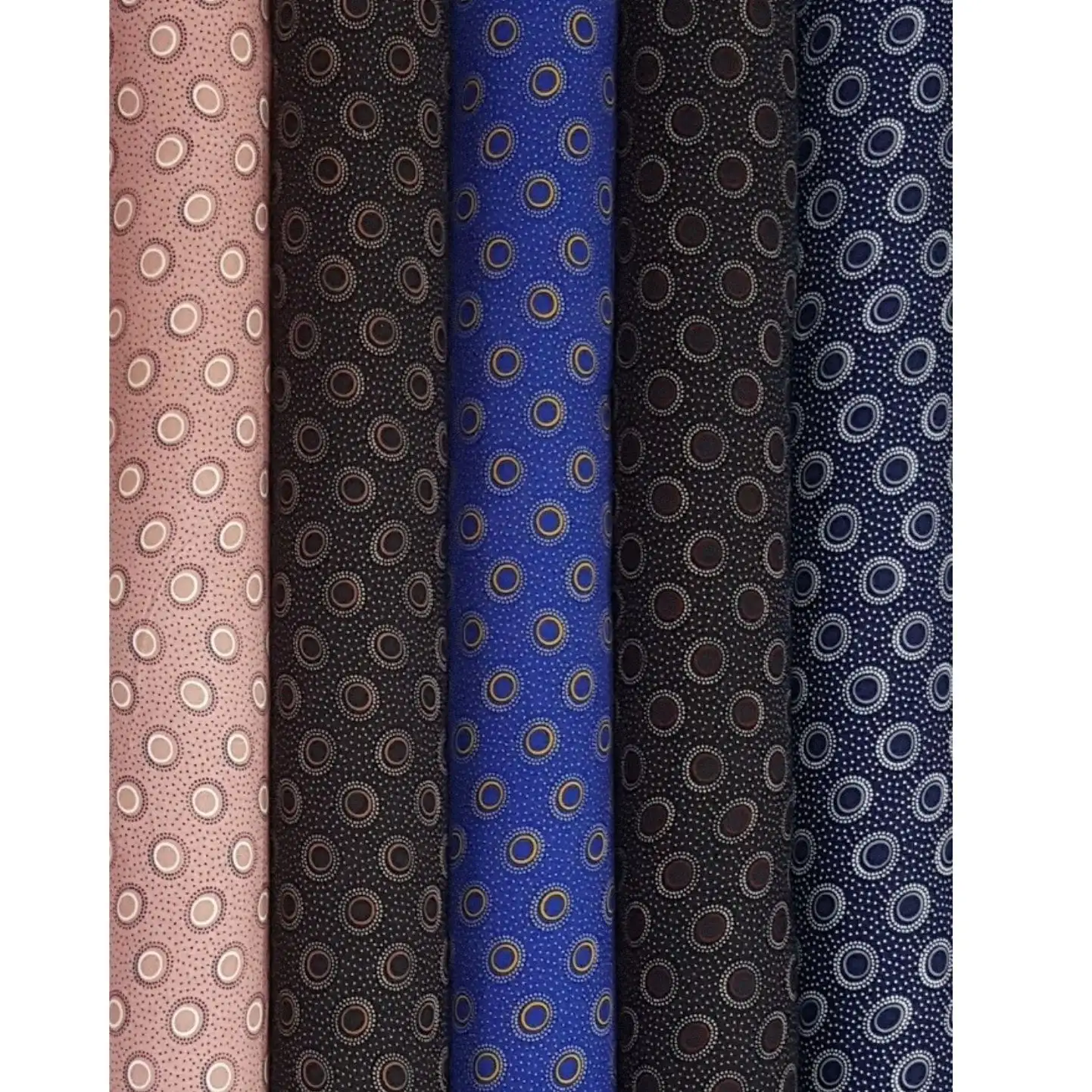 Stripes and Dots18 Collection, all colorways shown together. Concentric ringed dots and small scattered circles cluster densely across the fabric like a field of bubbles.