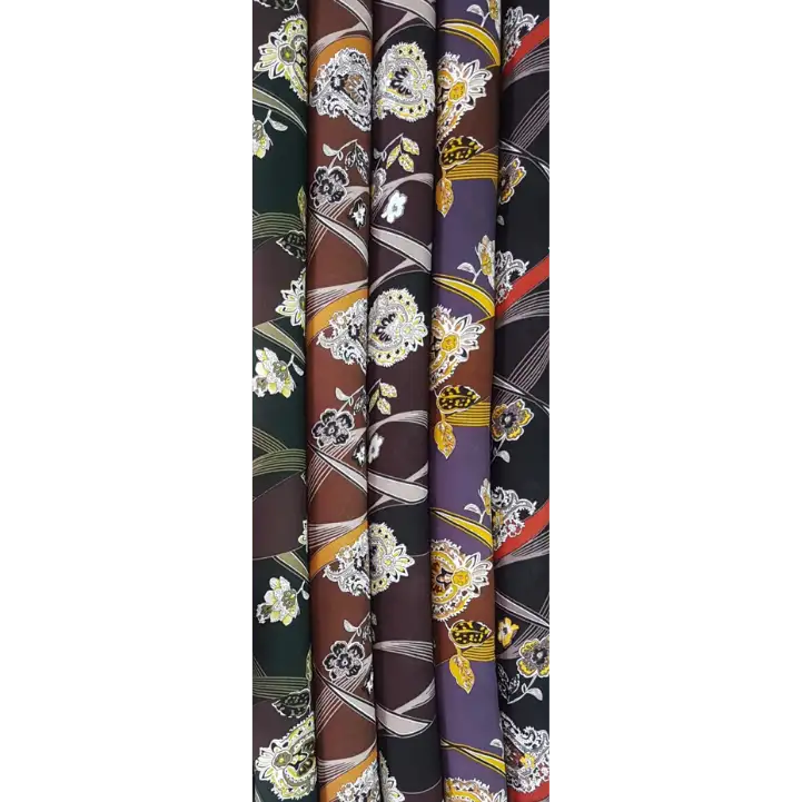 Floral22 Collection, all colorways shown together. Dense bouquets of full-blown roses and small buds scatter across a scrolling backdrop of slim leaves and stems.