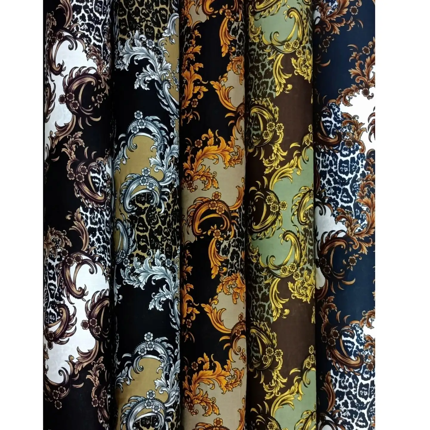 Geometric2 Collection, all colorways shown together. Ornate baroque scrollwork and flourishes wind across a background scattered with leopard-spot print.