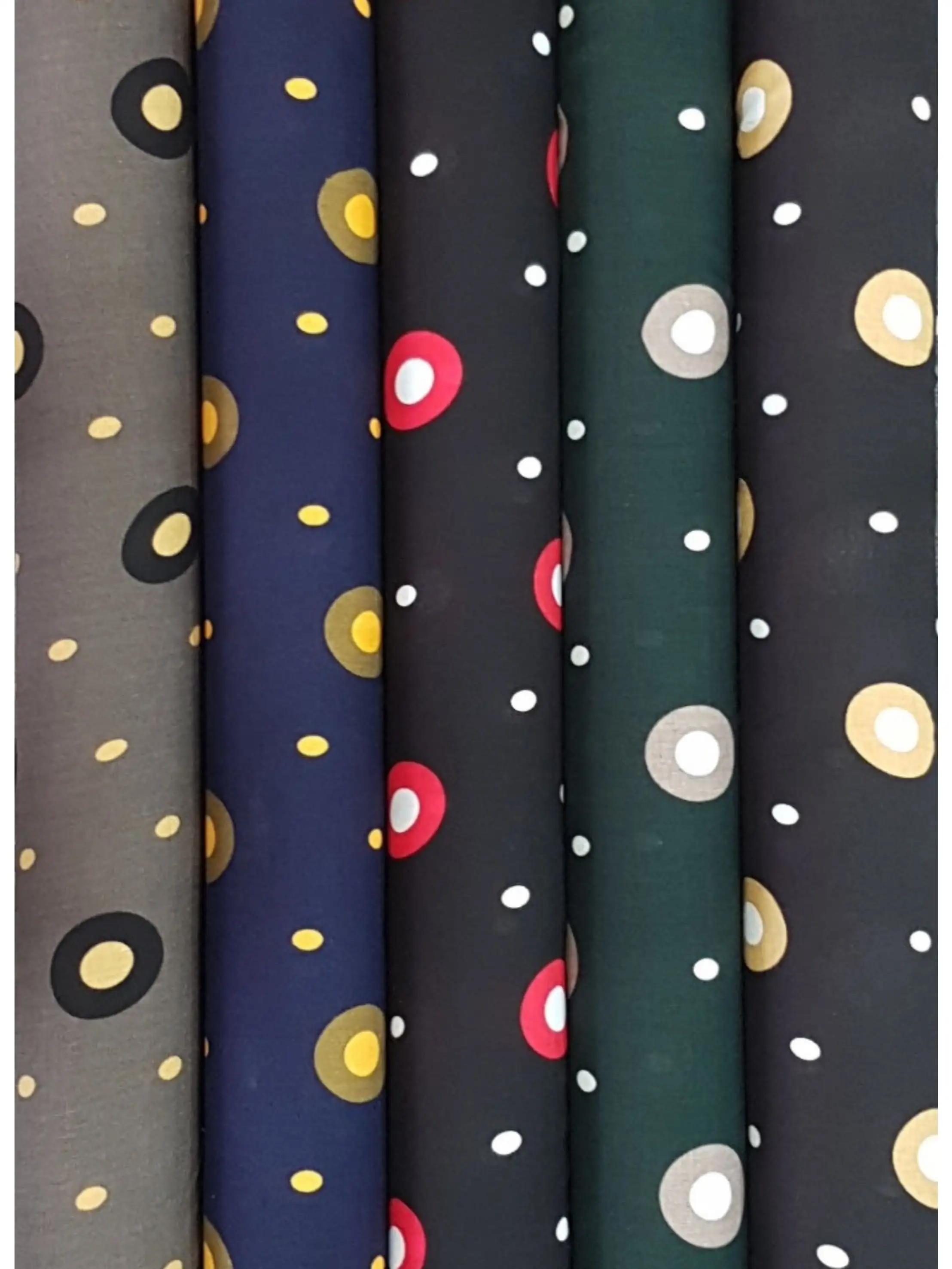 Stripes and Dots9 Collection, all colorways shown together. Scattered circular dots and ringed bubbles drift across the fabric in clustered and single sizes.