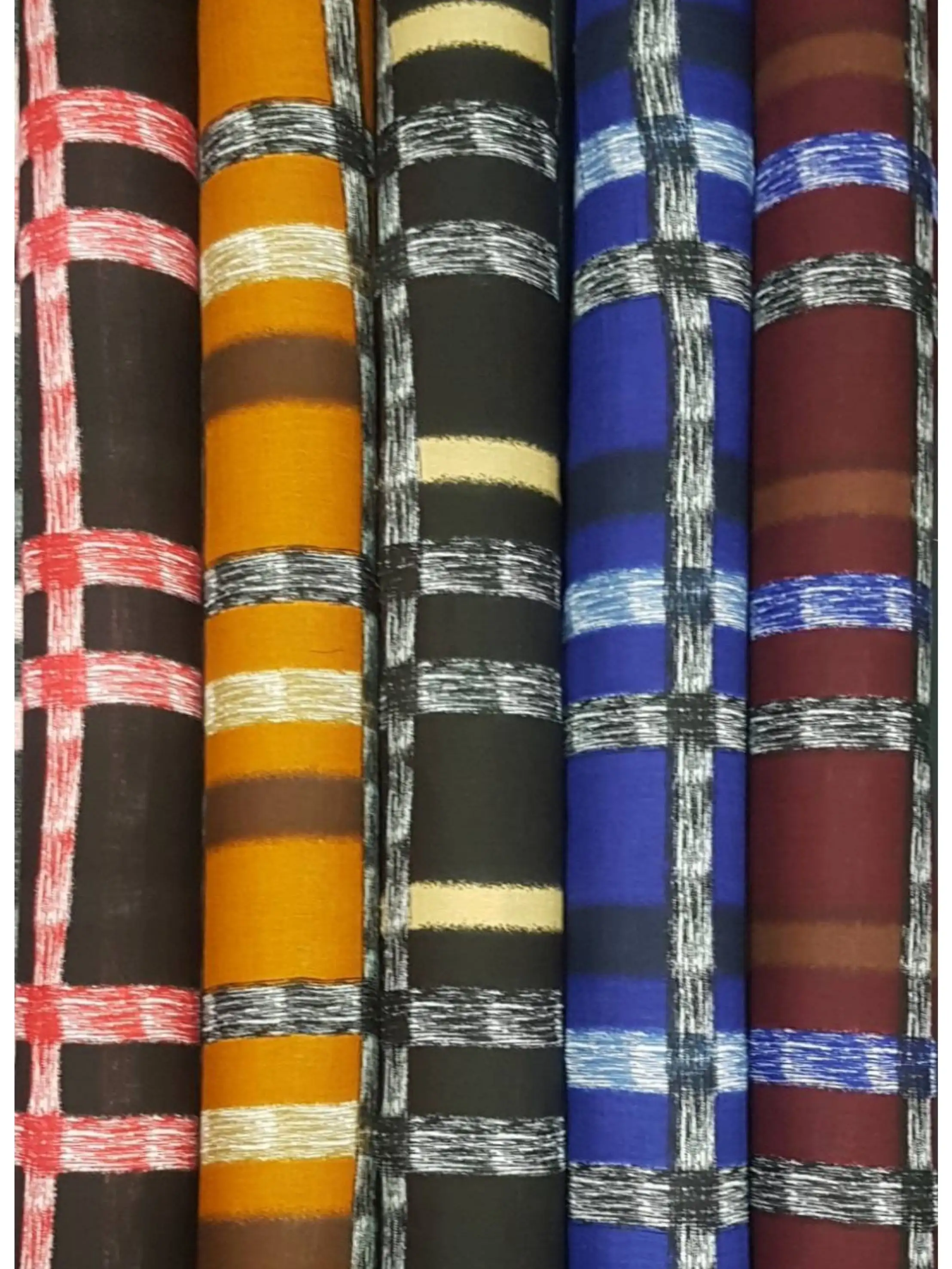 Stripes and Dots7 Collection, all colorways shown together. A windowpane check of broken, ikat-style cross stripes forms an irregular grid over a banded ground.