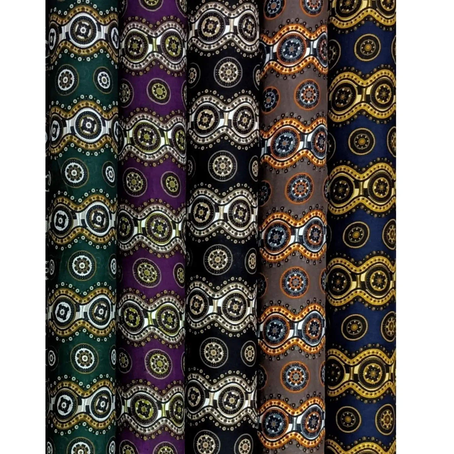 Geometric4 Collection, all colorways shown together. Rows of ornate medallion roundels alternate with smaller floral rosettes, linked by beaded scalloped bands.