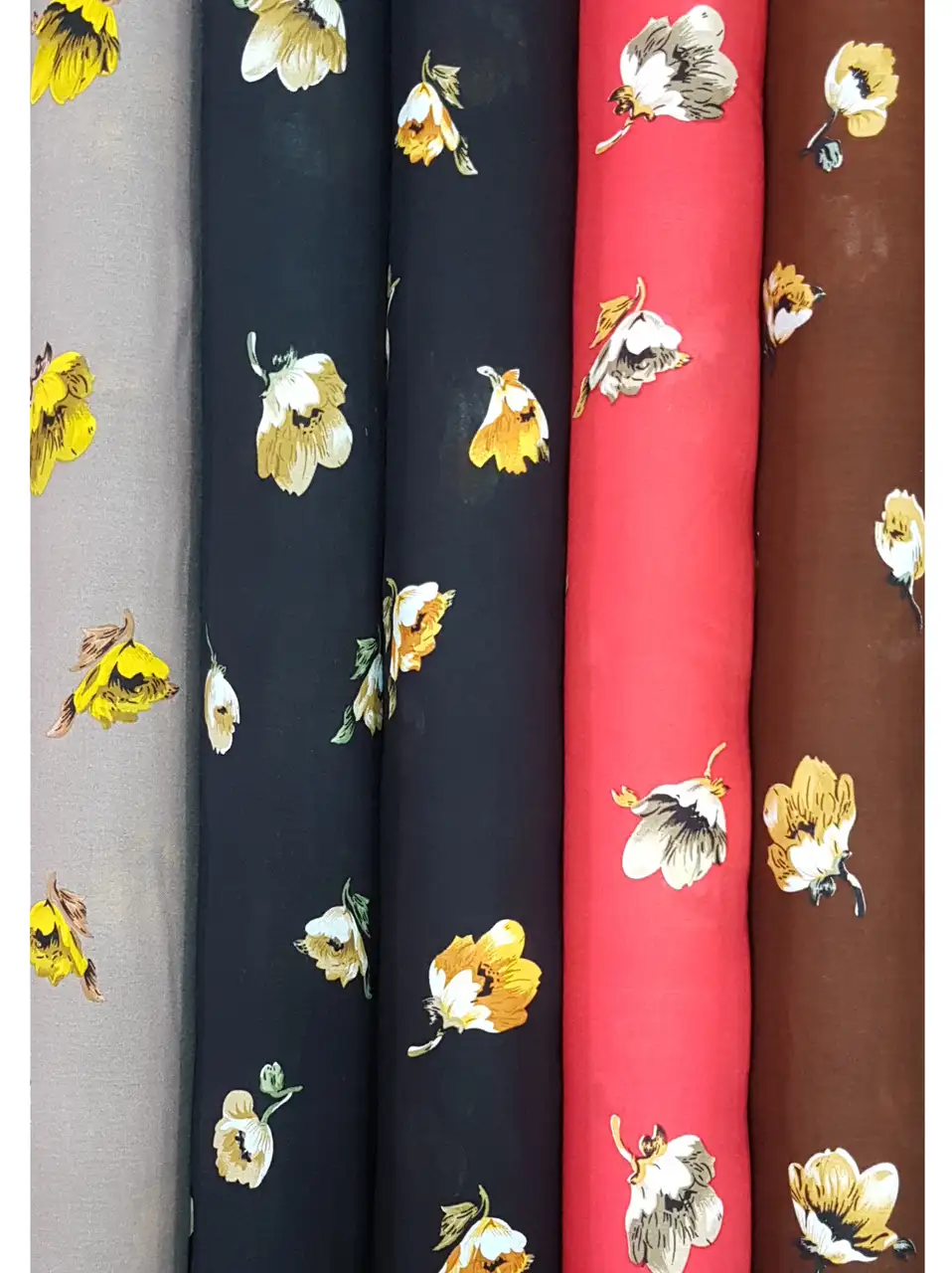 Floral17 Collection, all colorways shown together. Single large painterly blossoms with petal-shaped buds scatter loosely across an open ground.
