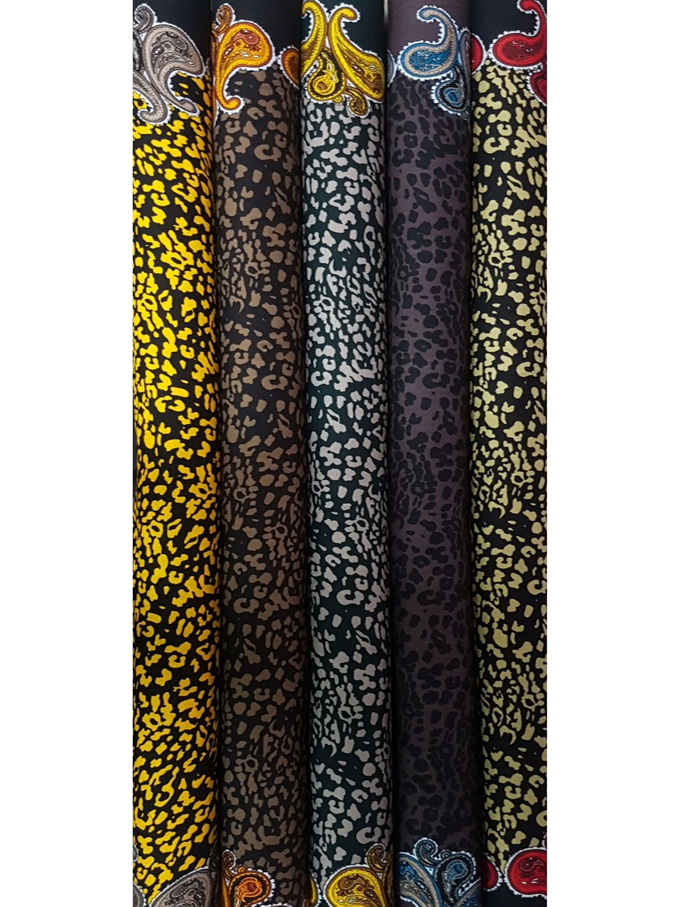 Stripes and Dots12 Collection, all colorways shown together. Scattered leopard spots cover the field, framed by ornate paisley motifs running along the top and bottom borders.