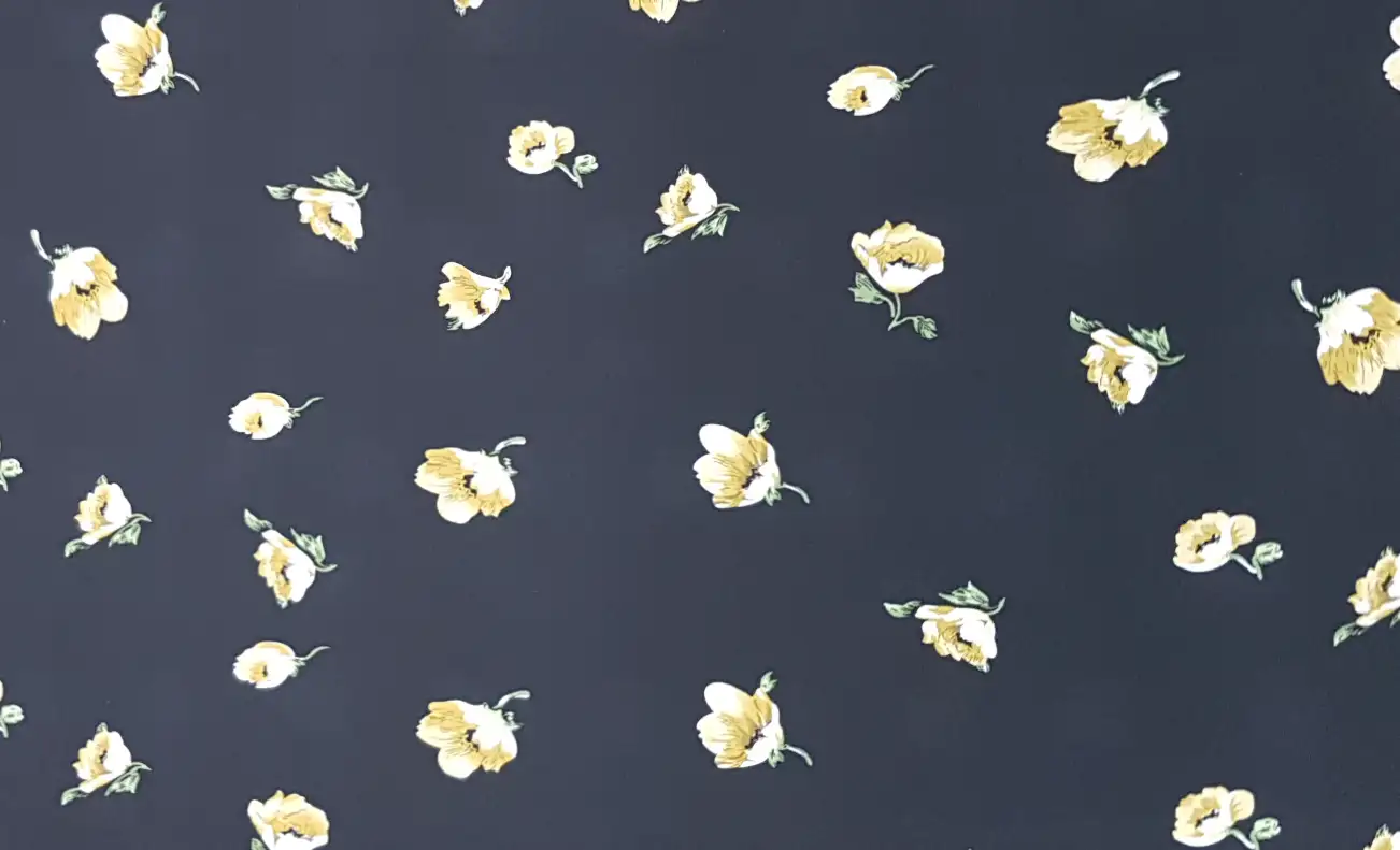Floral17 Collection in Black Beige. Warm taupe-beige ground with bright golden-yellow flowers and small brown leafy stems.