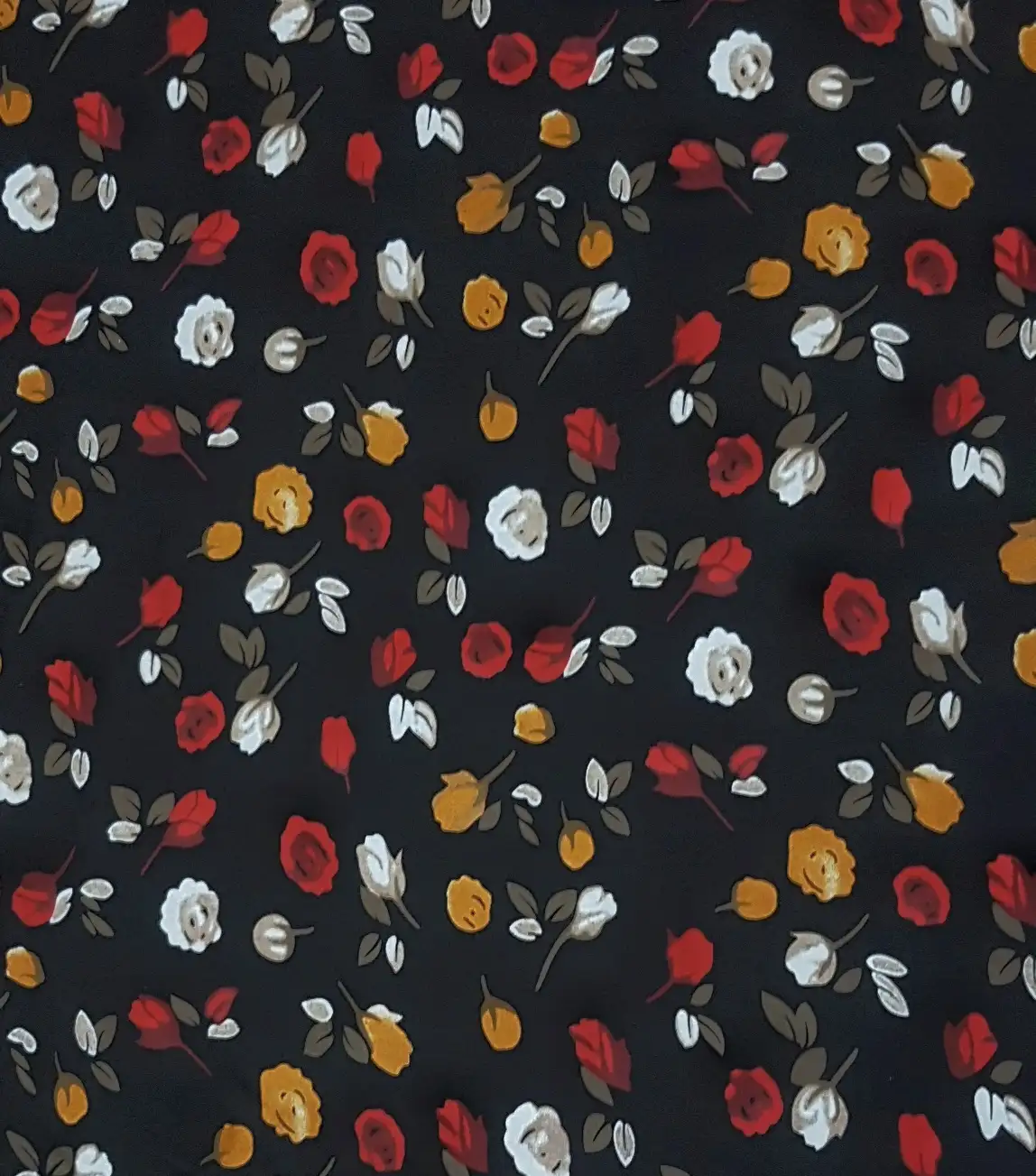 Floral18 Collection in Black Red. Black ground scattered with red, gold and cream roses among rust leaves and stems.
