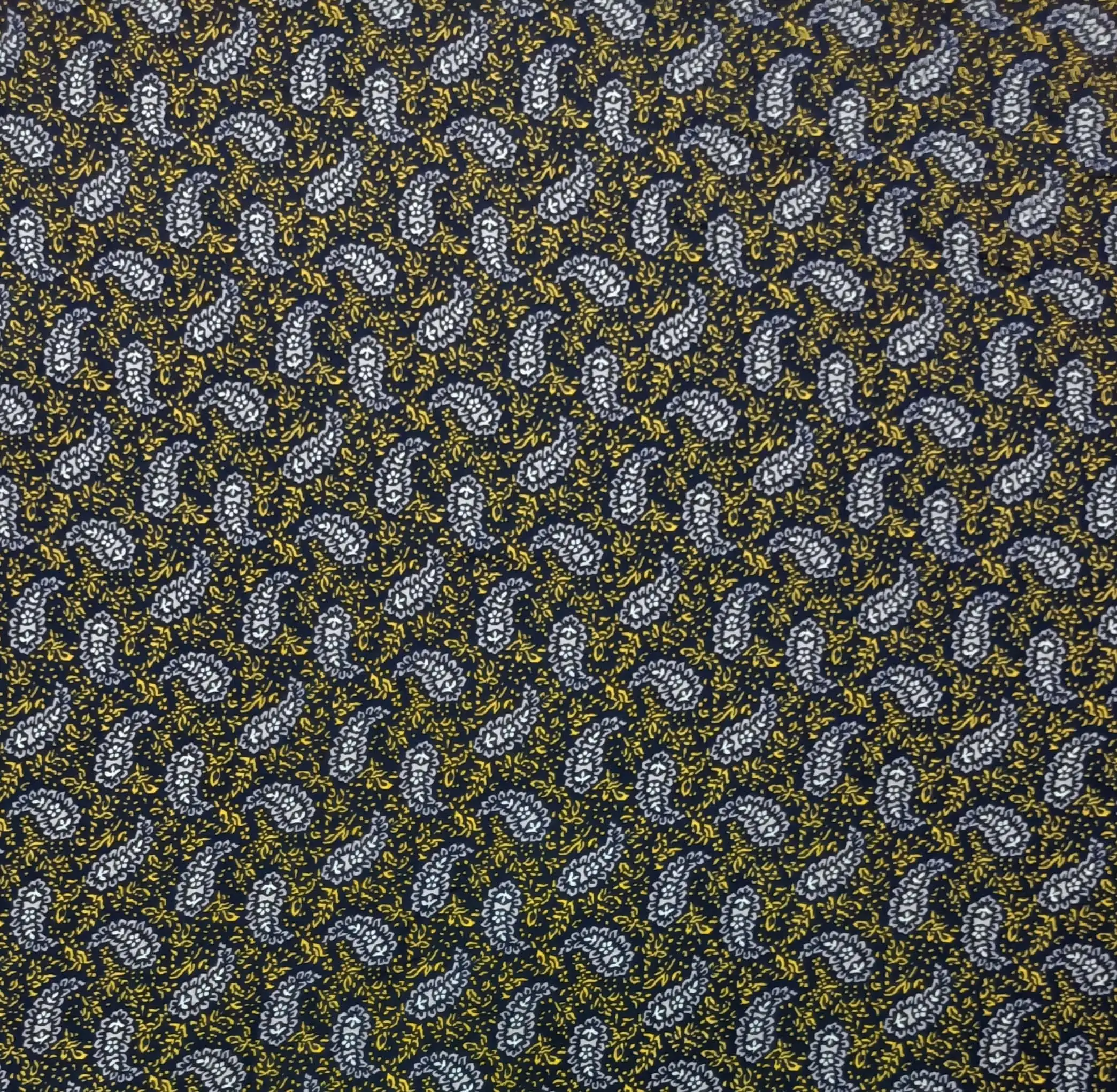 Geometric1 Collection in Black Yellow. Golden mustard ground packed with deep red and brown paisleys over swirling black foliage.