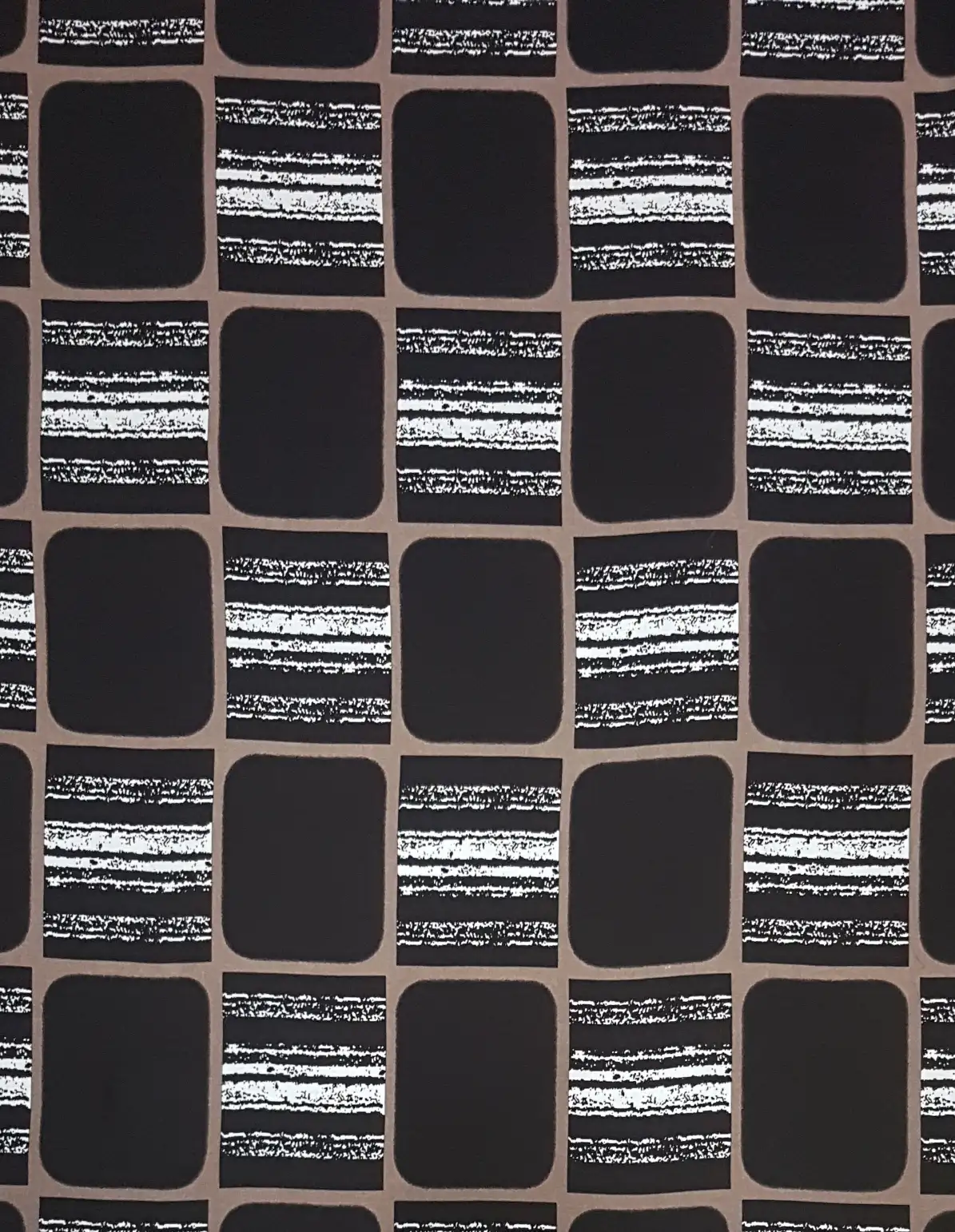 Geometric10 Collection in Black. Black ground with solid black blocks framed in tan, broken by chalky white and black streaked stripes.