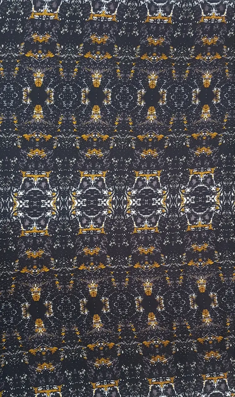 Geometric13 Collection in Black. Near-black charcoal ground scattered with mustard-gold and white speckles forming faded ornamental motifs.