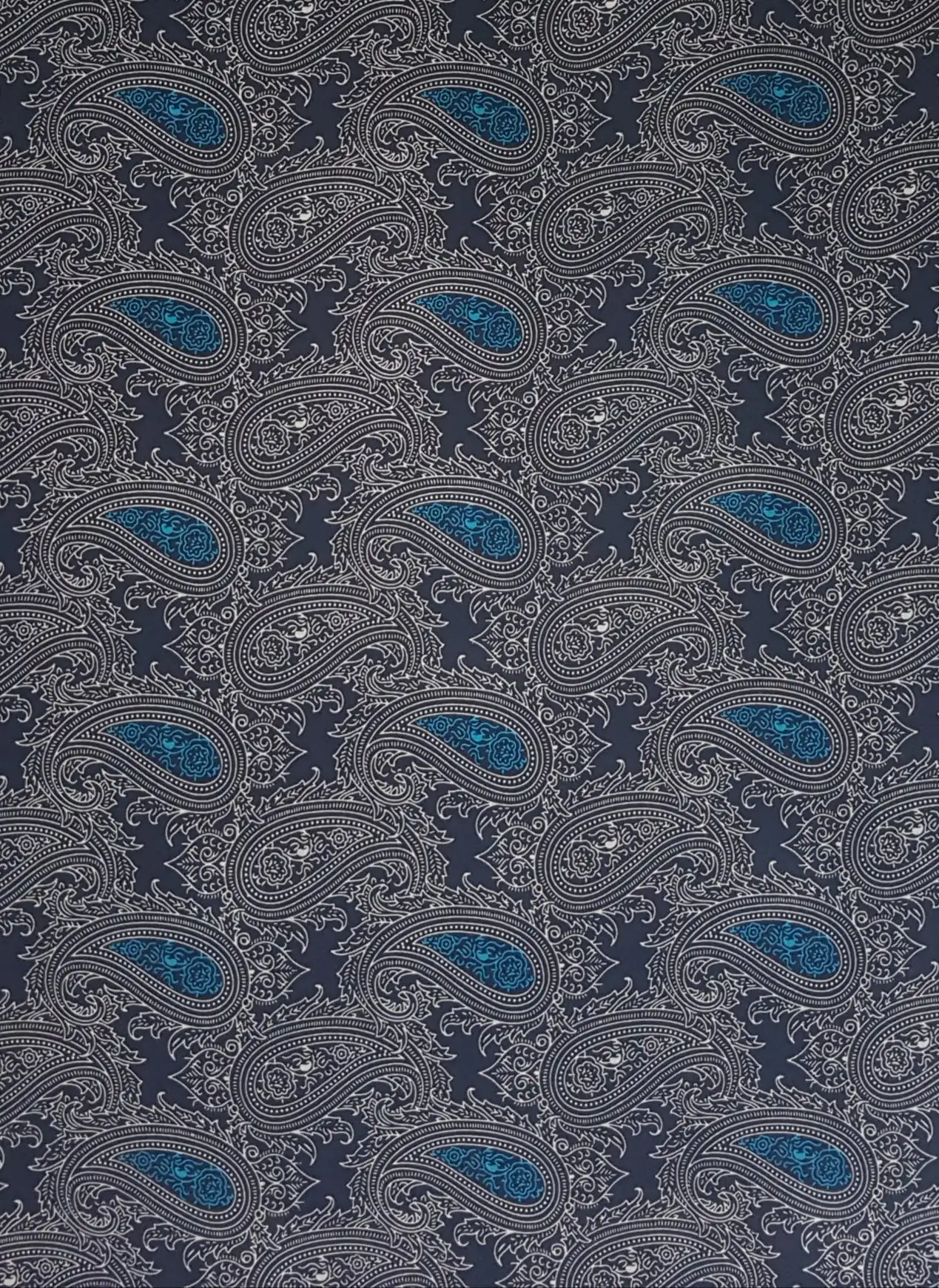 Geometric16 Collection in Blue. Slate-blue ground with navy paisleys and scrollwork, accented by bright cobalt teardrop centers.