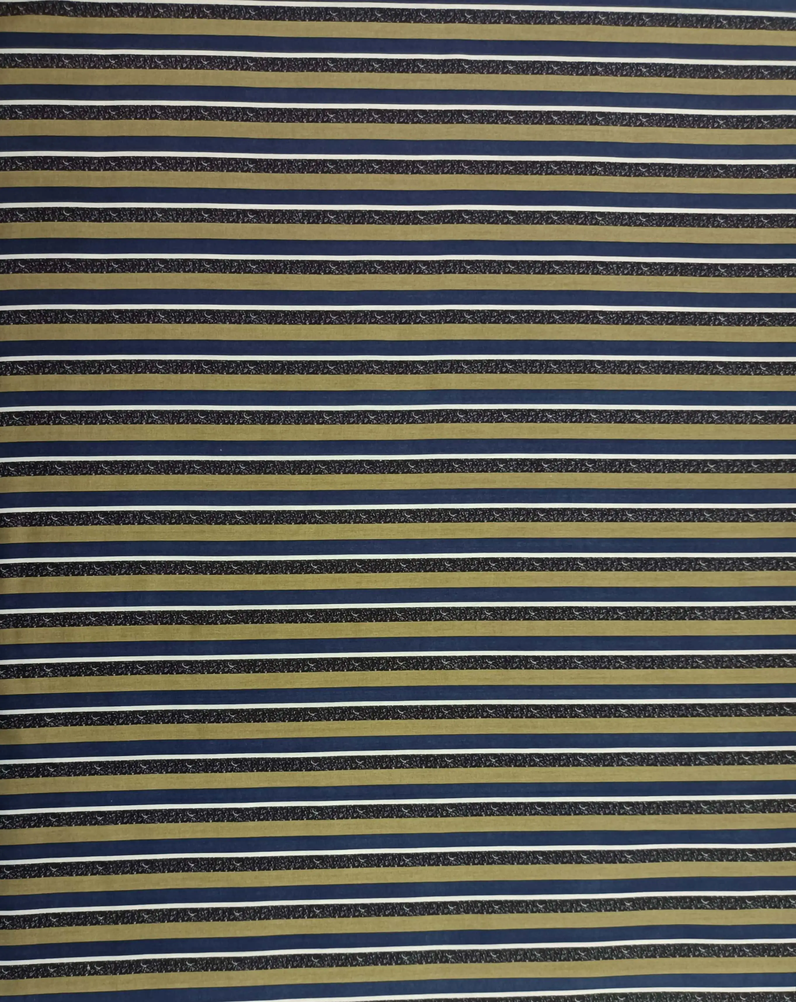 Stripes and Dots1 Collection in Blue. Deep navy ground banded with olive-gold stripes and speckled indigo ribbons edged in fine white lines.