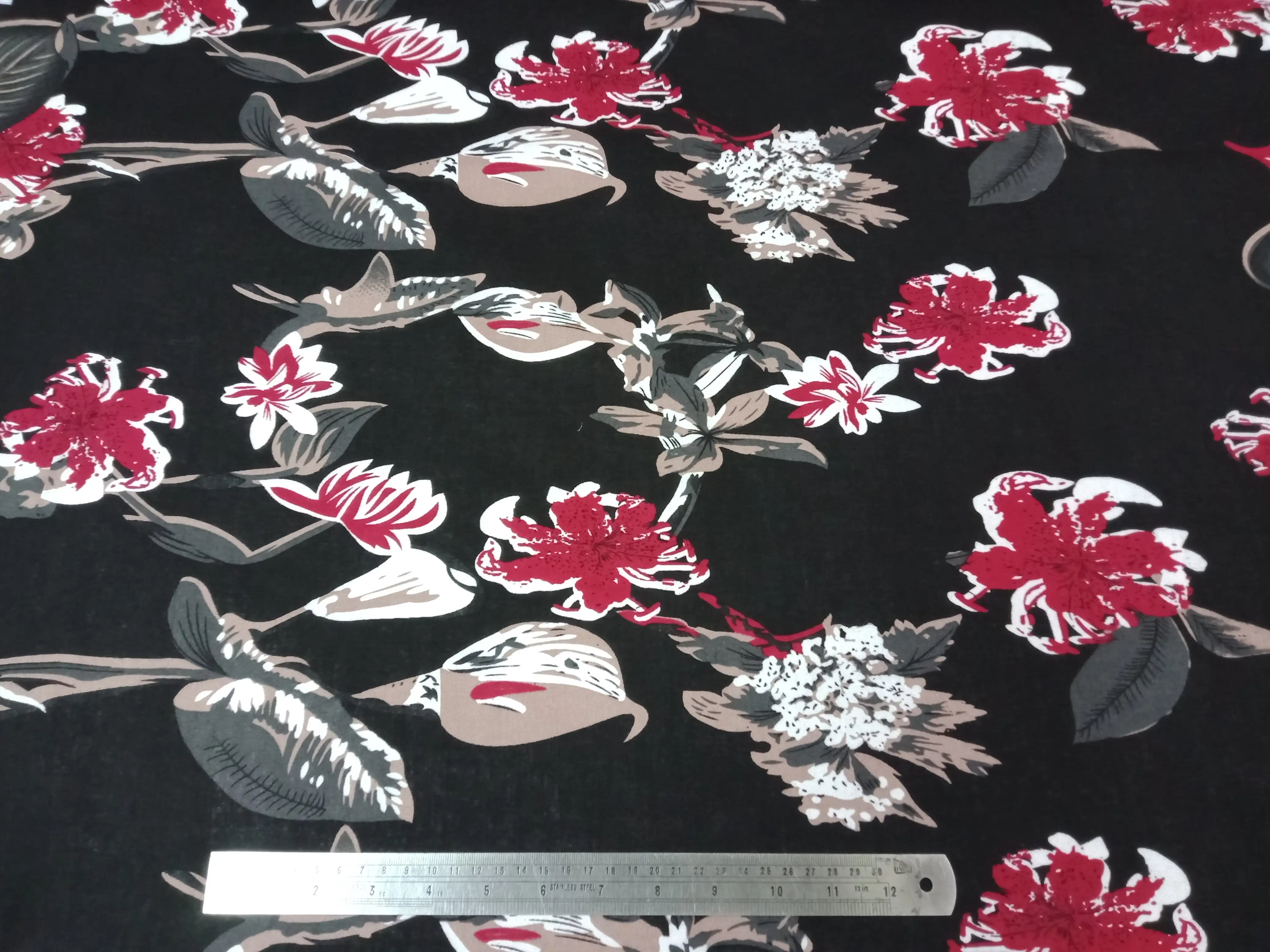 Floral8 Collection in Floral Black. Deep black ground with crimson-red blooms and pale grey foliage and stems.