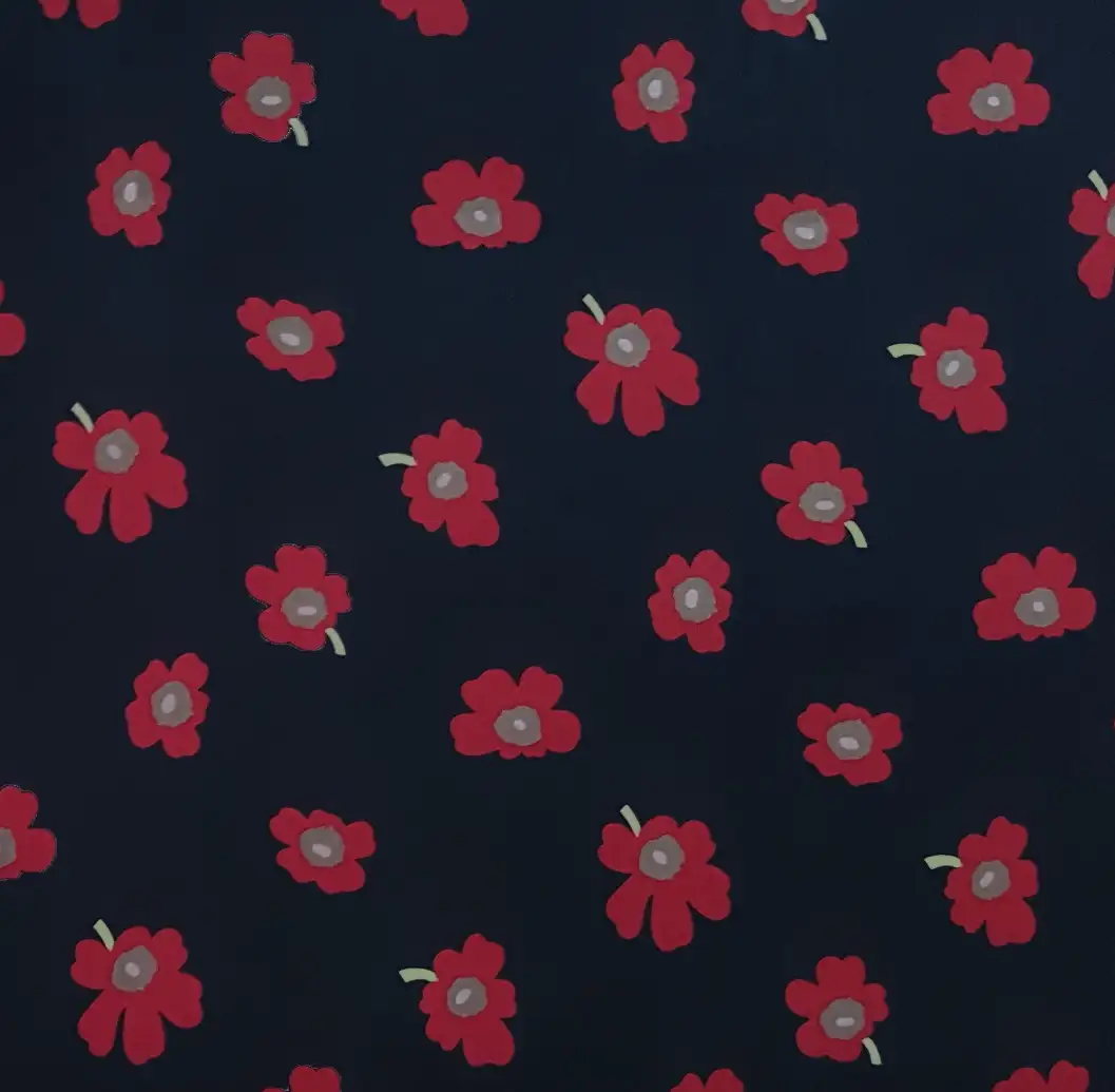 Floral6 Collection in Black Red. Deep black ground scattered with bold red blooms over small brown and cream centers.