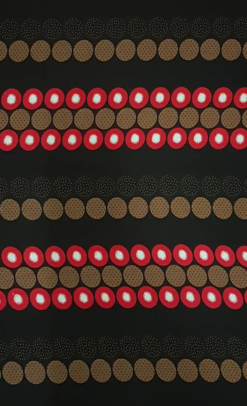Stripes and Dots14 Collection in Black Red. Black ground carrying bright red and tan dome-dots between fine dotted rows.