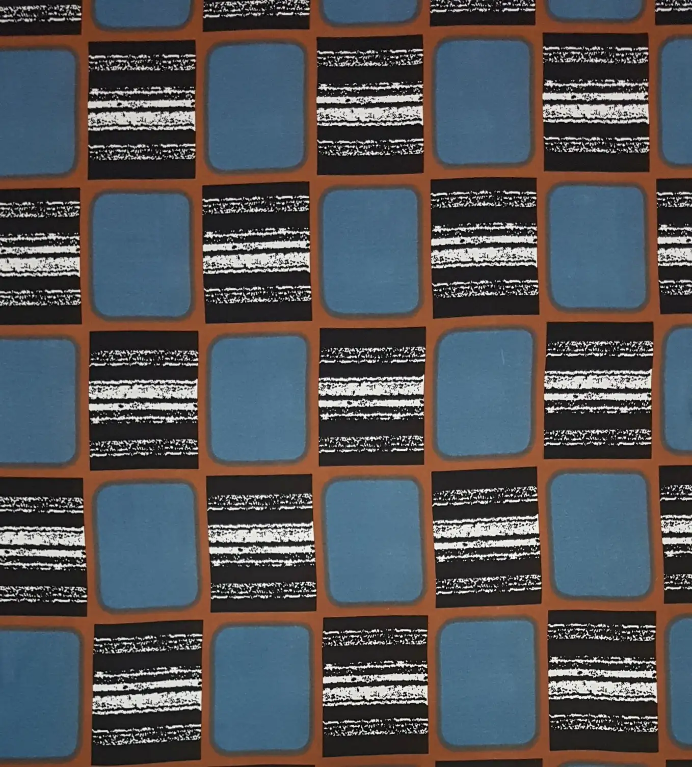 Geometric10 Collection in Blue. Steel-blue blocks set on black, divided by gritty white, rust, and black banded stripes.