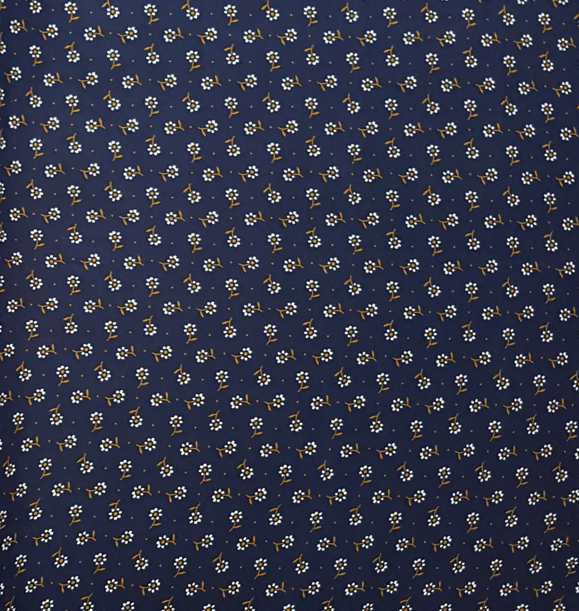Floral5 Collection in Blue. Royal blue ground carrying white and pale yellow daisies with light blue bud sprigs.