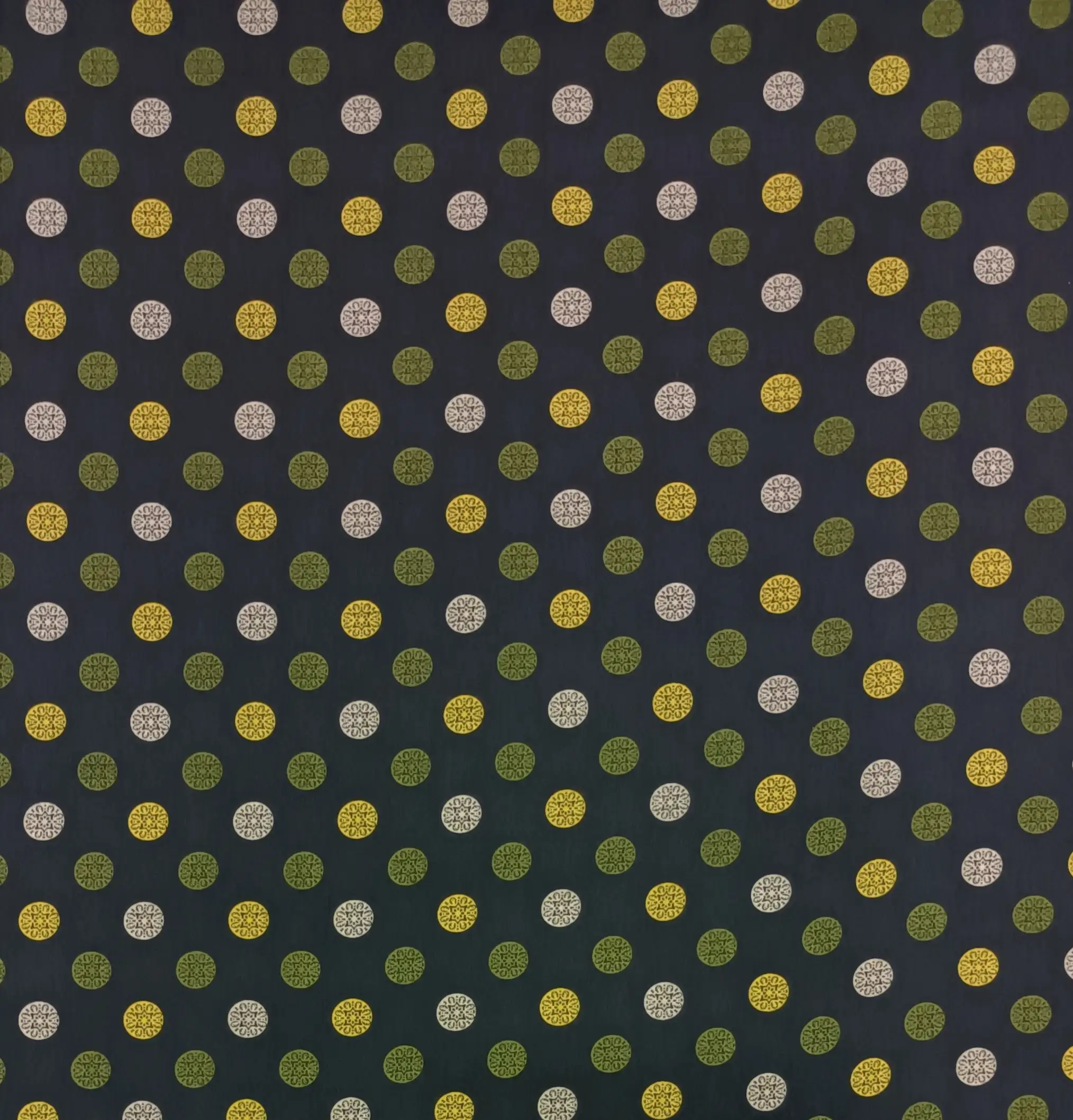 Stripes and Dots3 Collection in Green. Black ground carries olive-green, mustard-gold, and cream dots, many filled with snowflake starbursts.