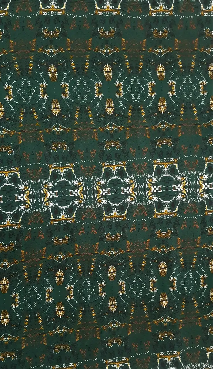 Geometric13 Collection in Green. Dark teal-green ground patterned with tan, cream, and rust medallions and weathered speckling.