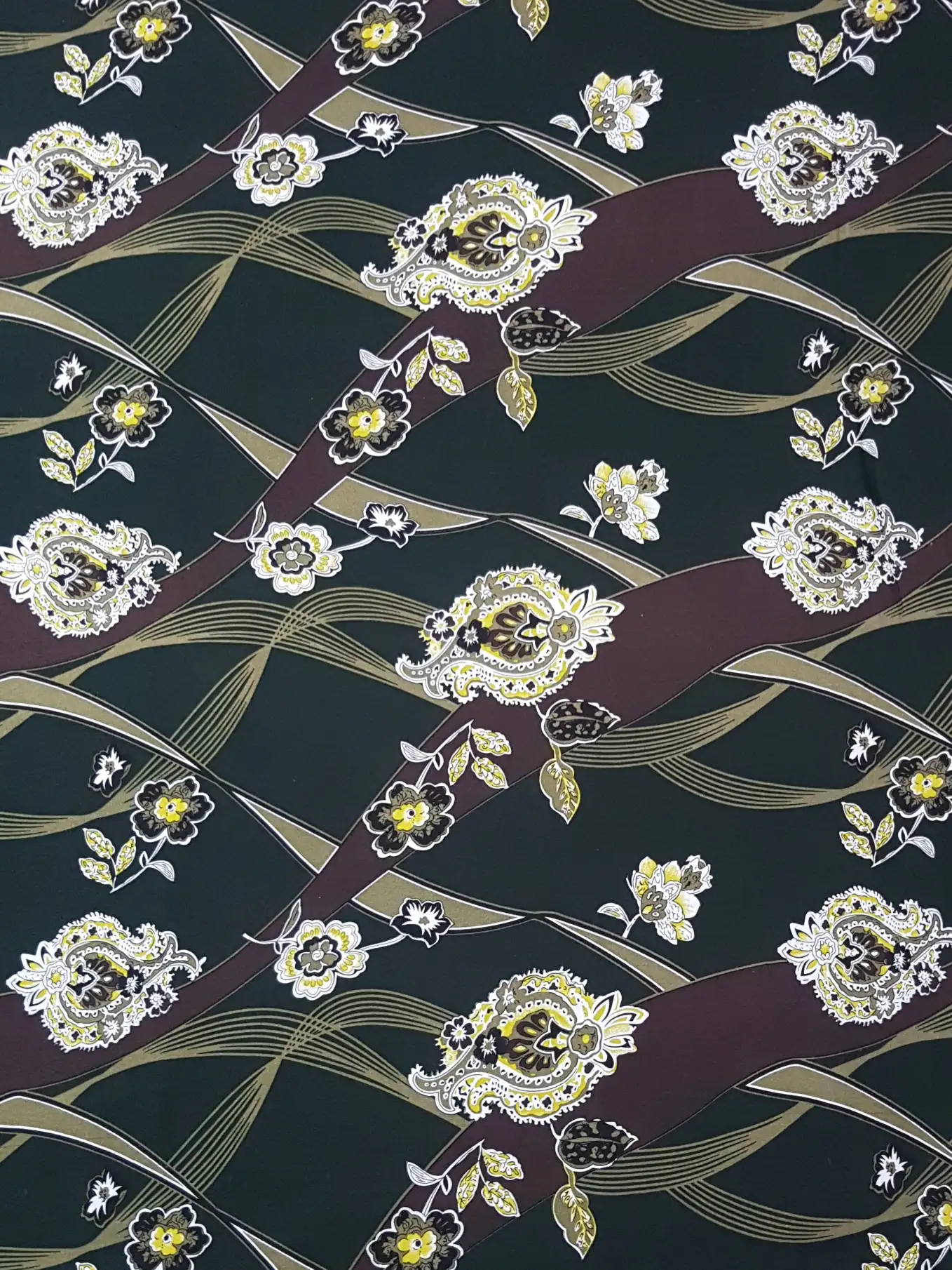 Floral22 Collection in Green. Mossy olive-green ground holds pale cream flowers, soft pink buds and darker leafy sprays.