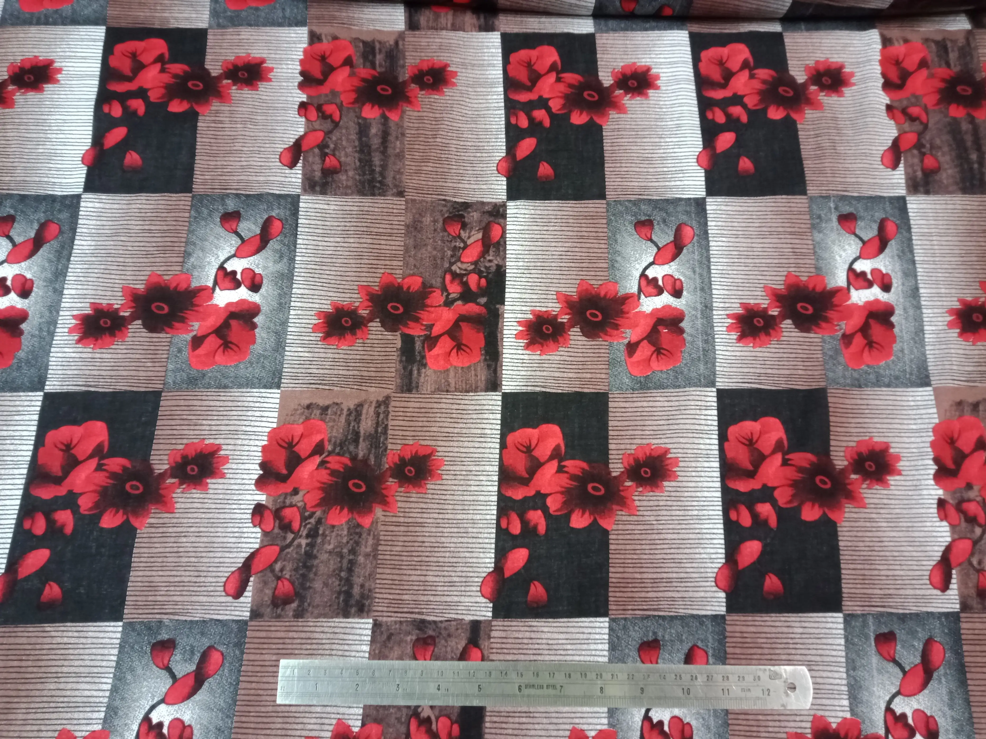 Floral16 Collection in Grey. Soft taupe-grey panels show scattered red flowers and buds over muted brown banding.