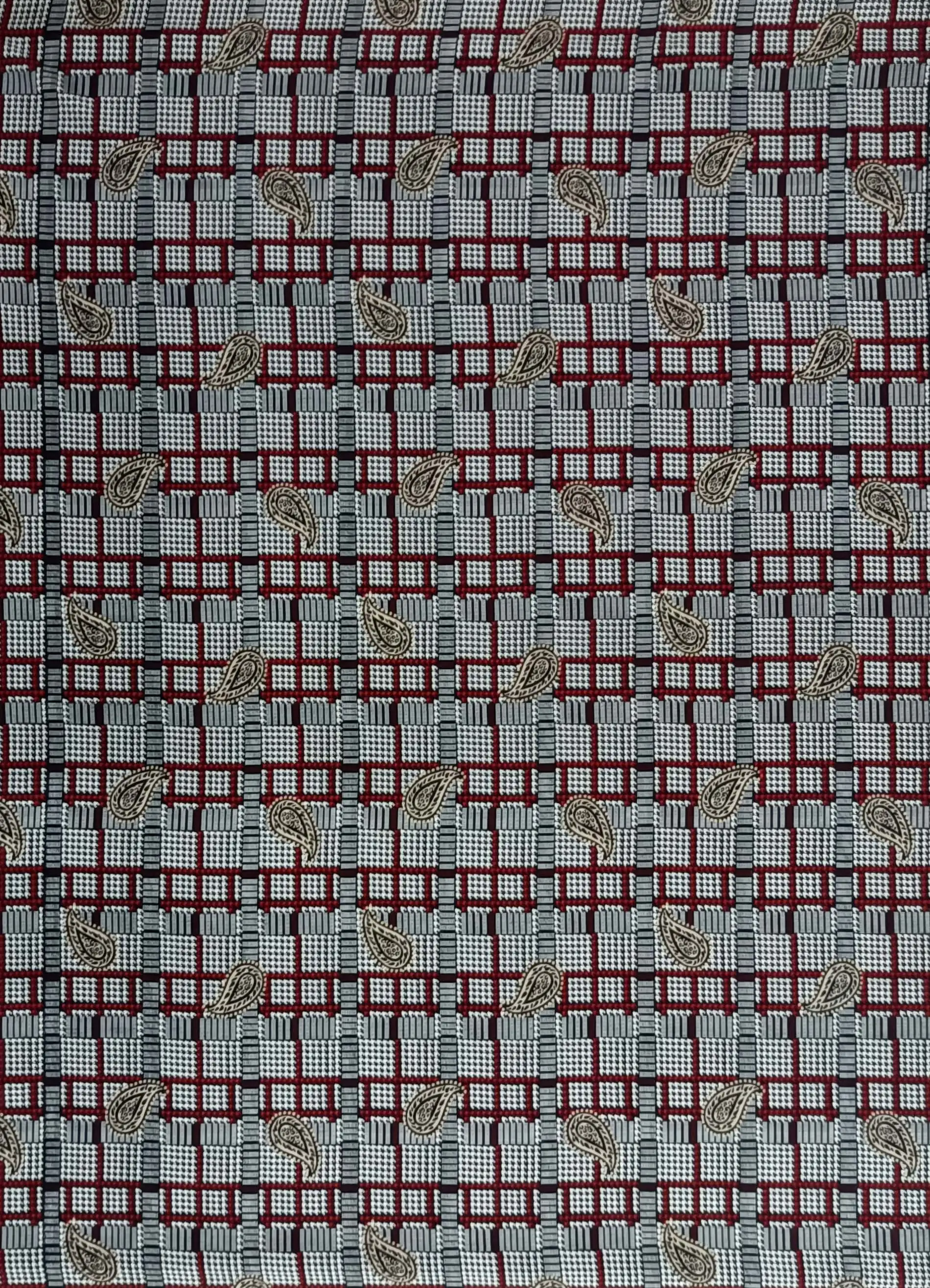 Geometric7 Collection in Light Grey. Soft grey houndstooth ground with steel-blue checks and dark grey paisley teardrops scattered throughout.