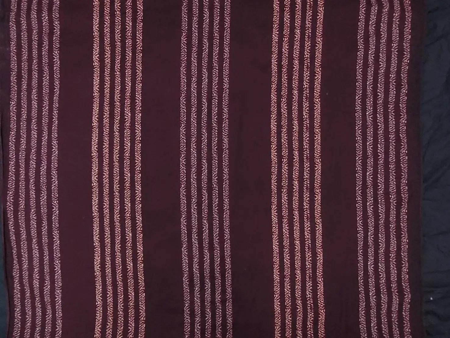 Stripes and Dots11 Collection in Maroon. Rich wine-maroon ground patterned with stripes of magenta, gold, and dark speckled dots.