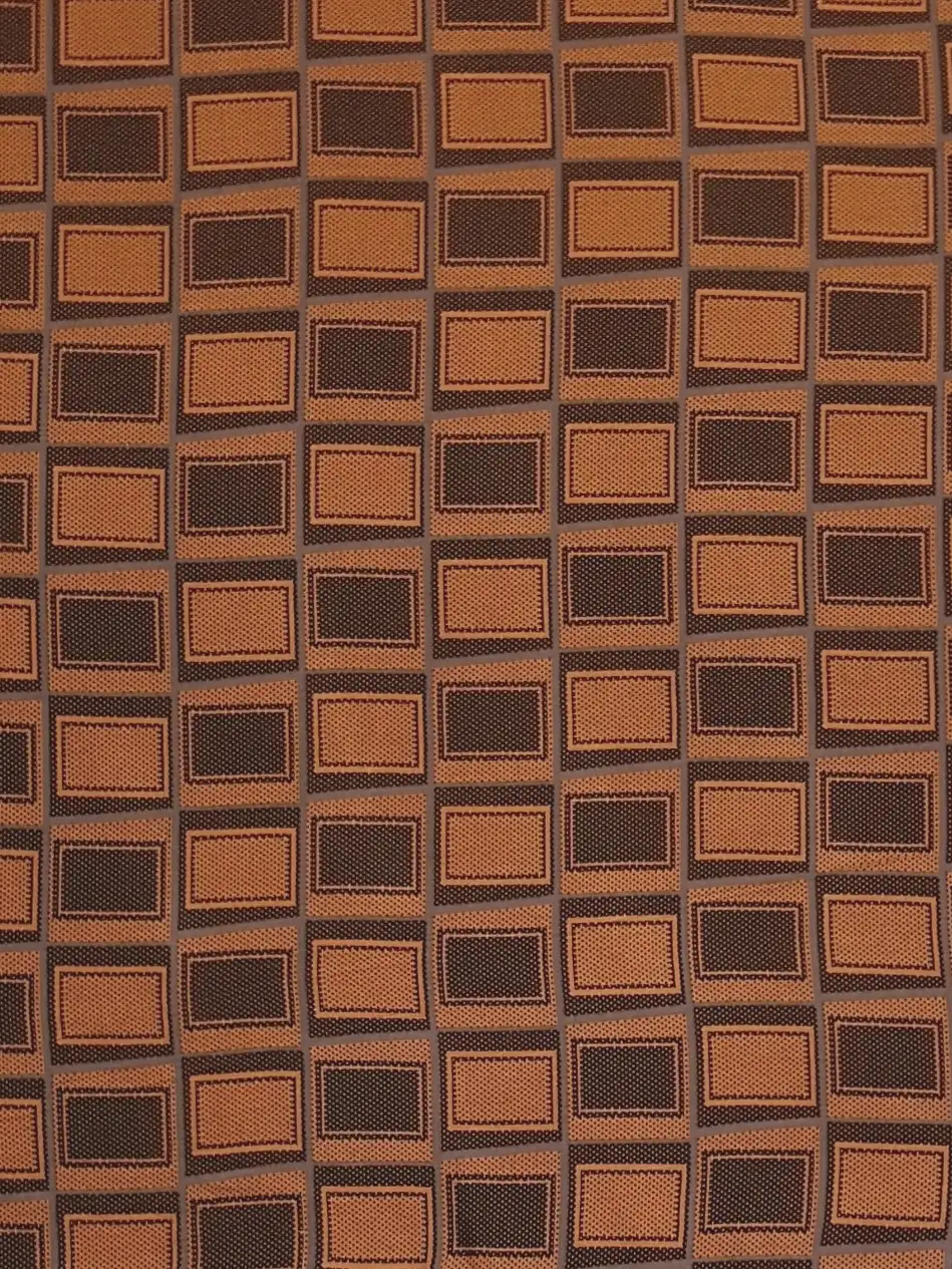 Geometric14 Collection in Orange. Bright orange ground packed with dark brown and chocolate rectangular frames in close rows.