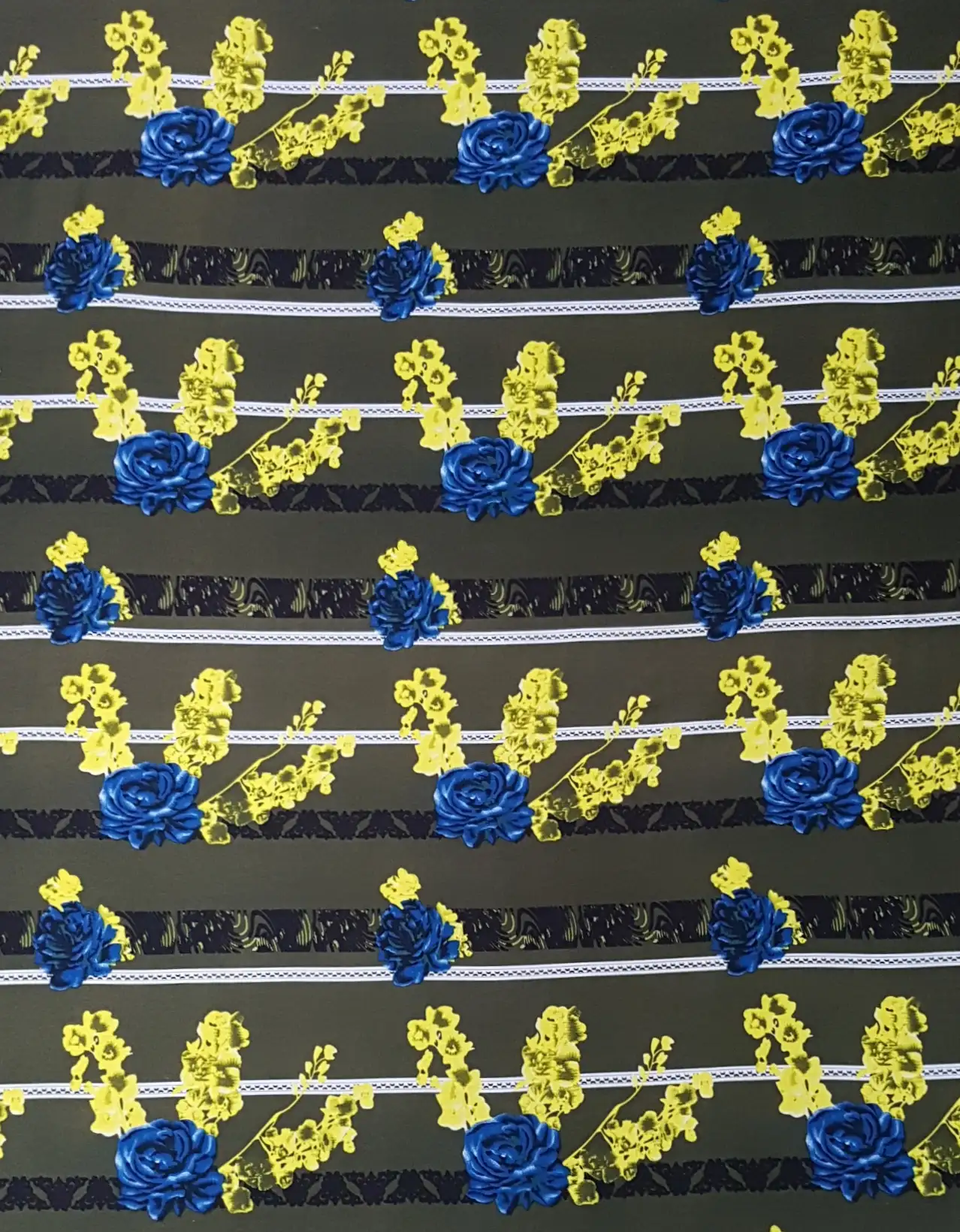 Floral20 Collection in Green Blue Flowers. Olive green ground scattered with cobalt blue roses and vivid yellow flowers over black stripes.
