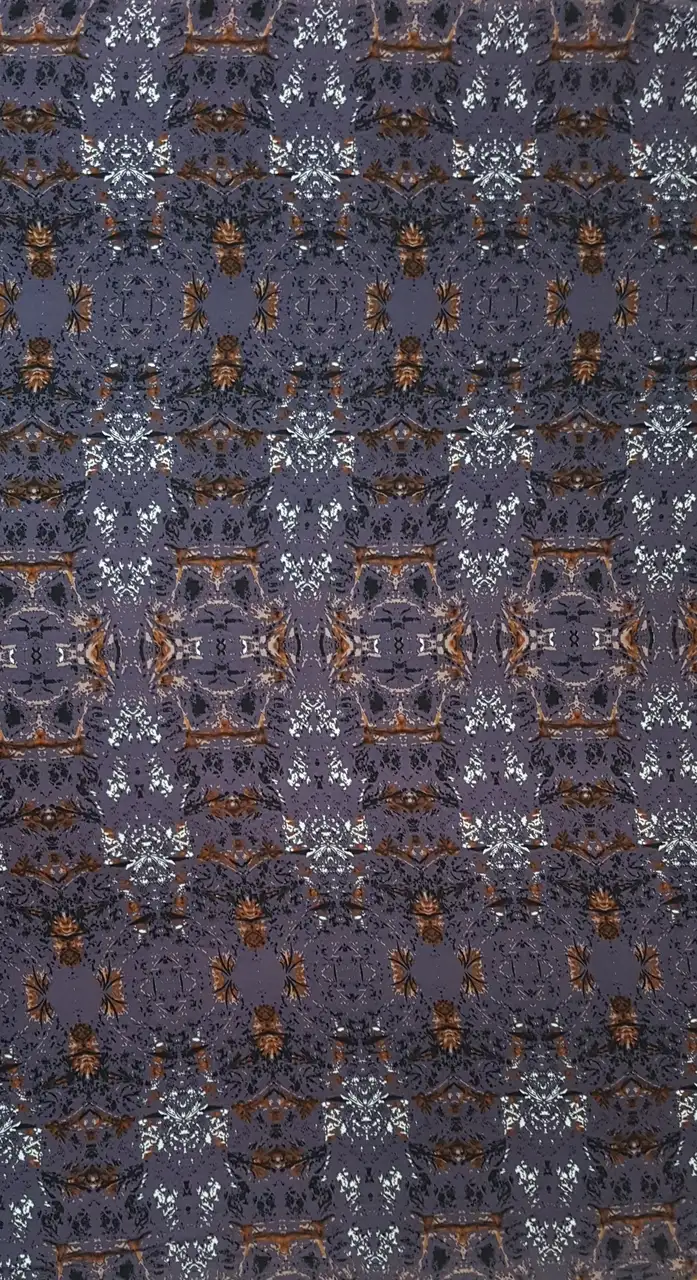 Geometric13 Collection in Purple. Dusty grey-purple ground washed with brown, ivory, and faded charcoal carpet-style ornament.