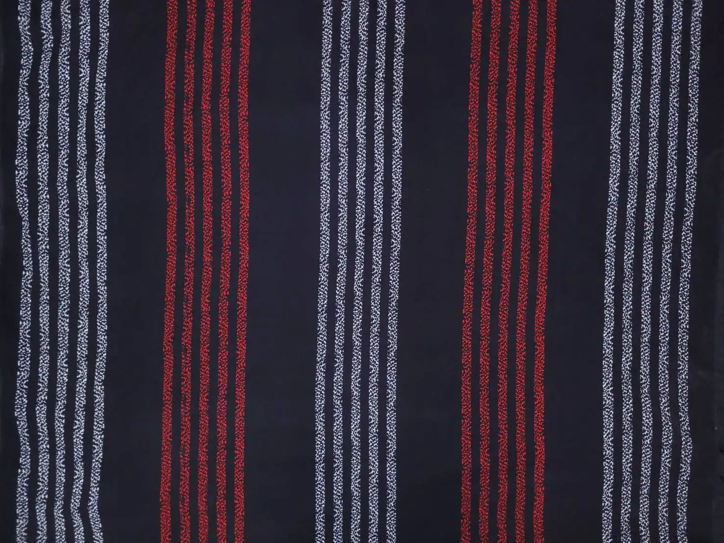 Stripes and Dots11 Collection in Red White. Charcoal-grey ground striped with rows of golden-yellow speckled dots in even bands.