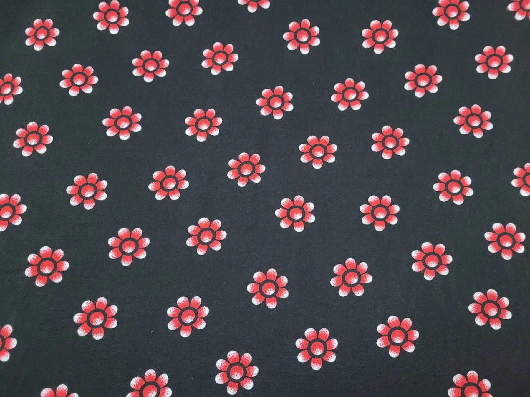 Floral11 Collection in Red. Black ground with soft coral-pink daisies, each petal shaded toward a pale creamy middle.