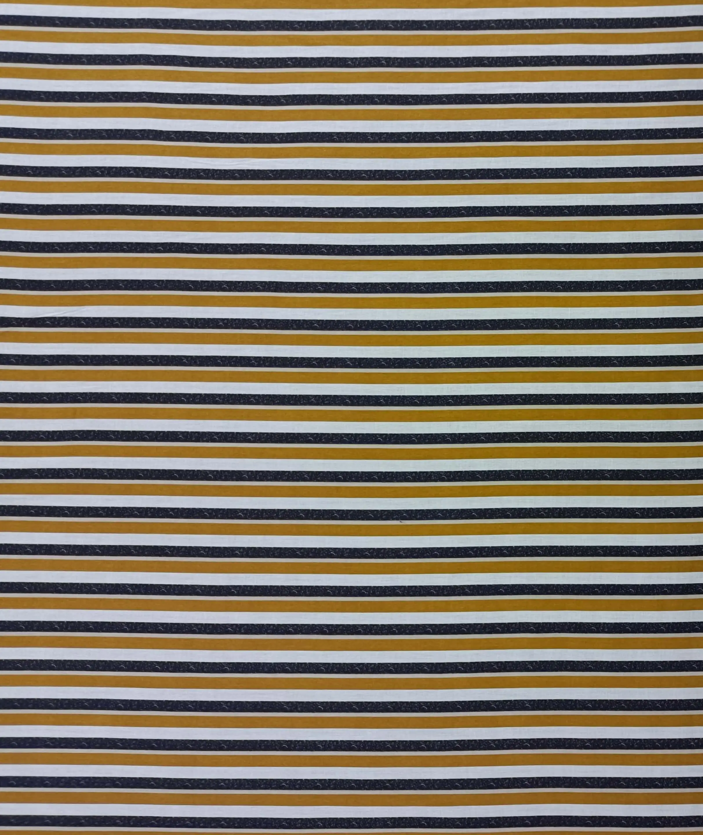 Stripes and Dots1 Collection in White. Pale blue-white and mustard-gold stripes sit on a dark navy ground flecked with tiny dots.