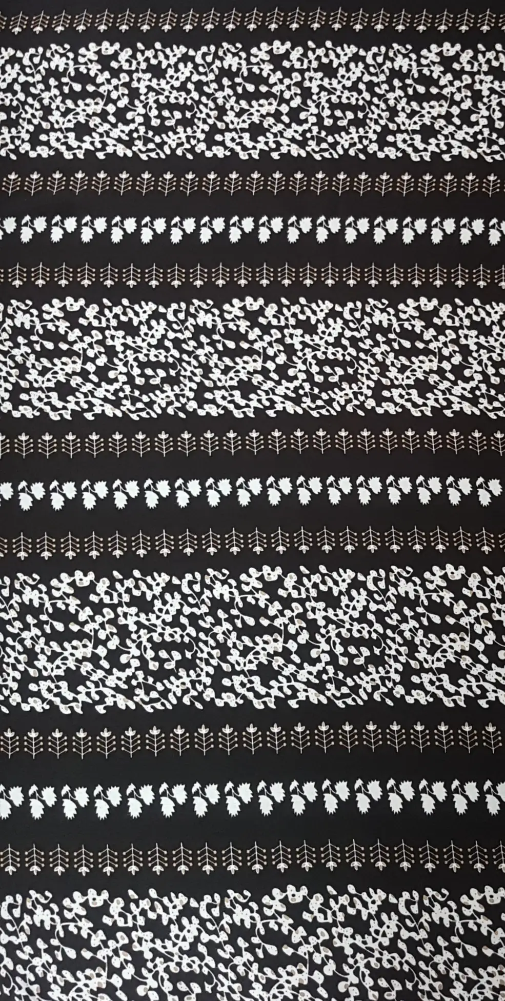 Floral15 Collection in White. Black ground scattered with bright white leaves and berries and white standing plant rows.