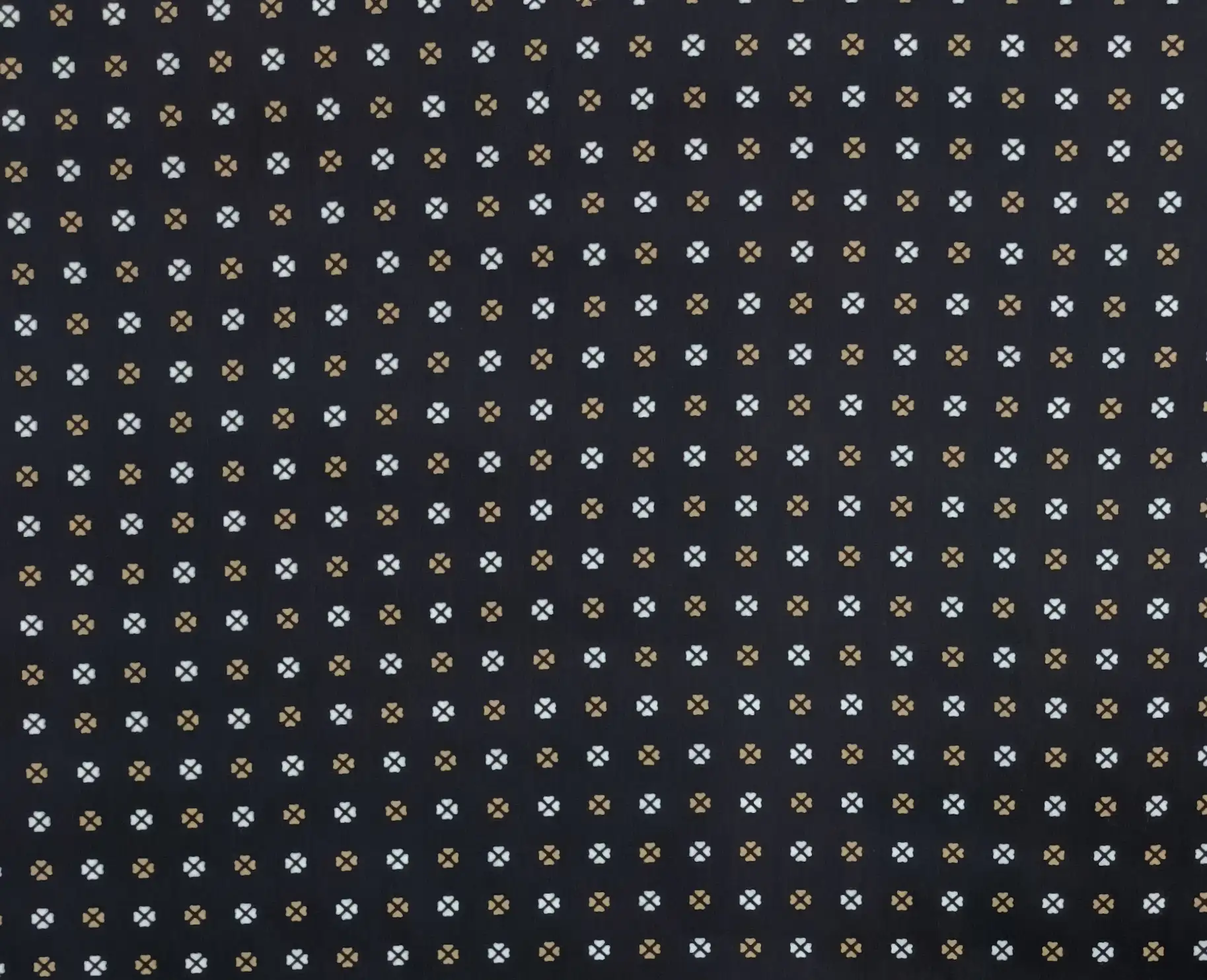 Geometric3 Collection in White. Black ground dotted with amber-orange crossed circles and silvery-white floral specks throughout.