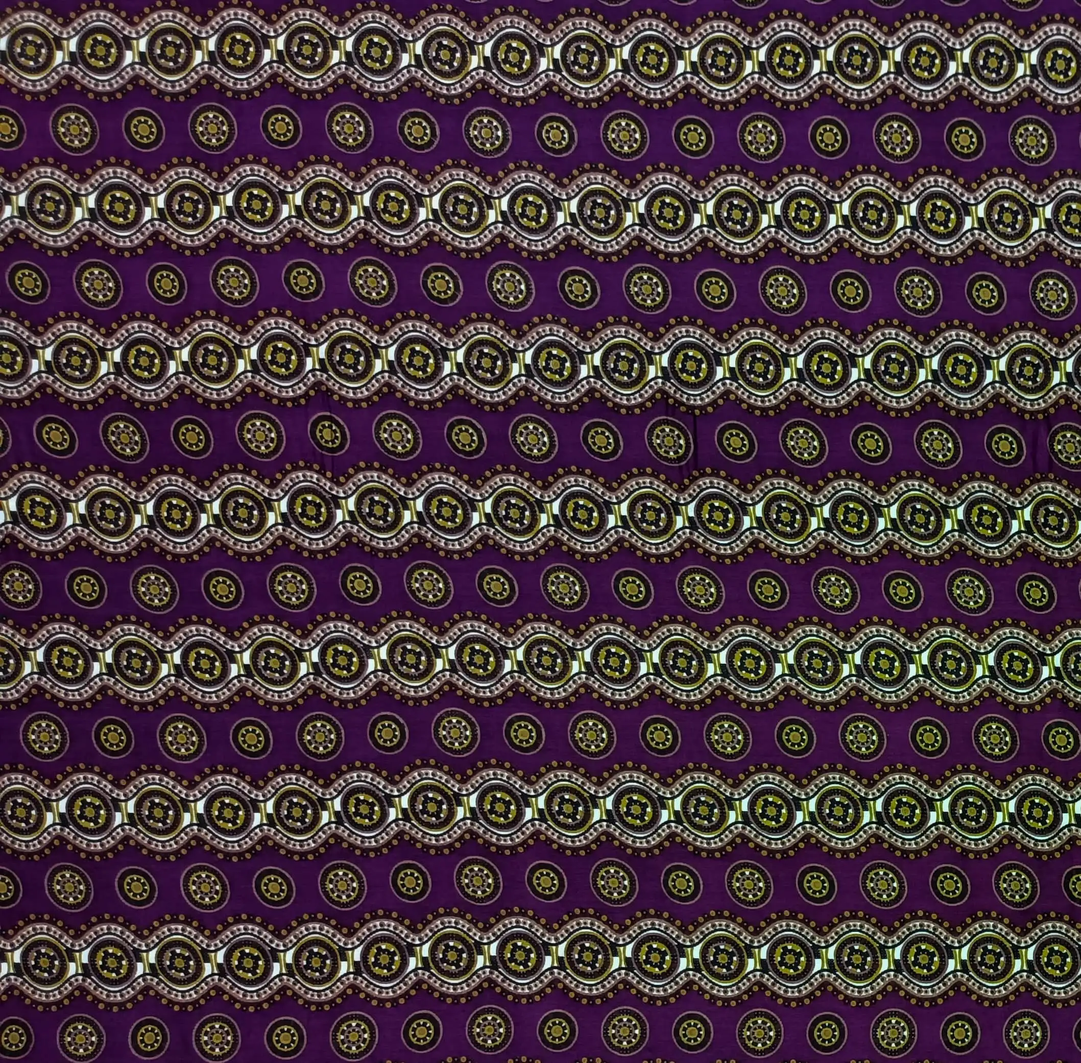 Geometric4 Collection in Purple. Navy ground with golden-yellow and amber medallions framed by glowing gold scalloped trim.