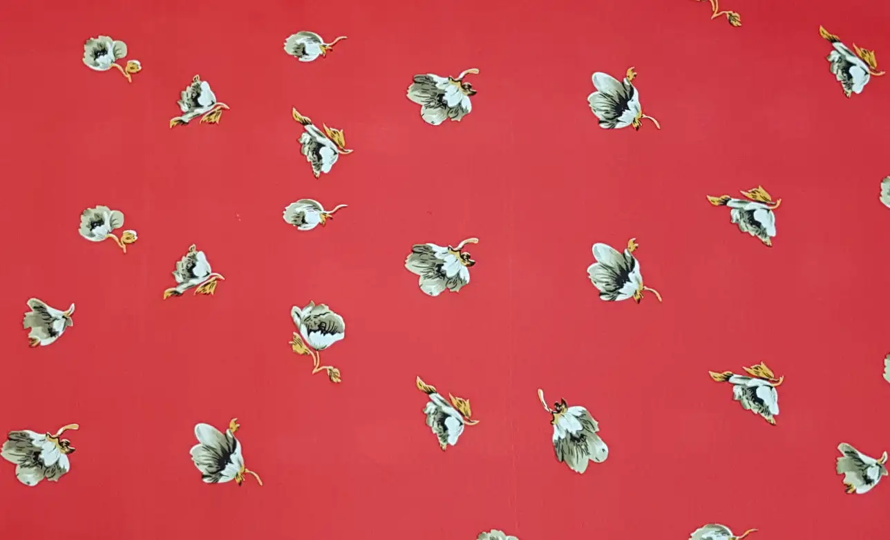 Floral17 Collection in Red Grey. Rich chestnut-brown ground with creamy white and yellow-gold blossoms and dark green leaves.