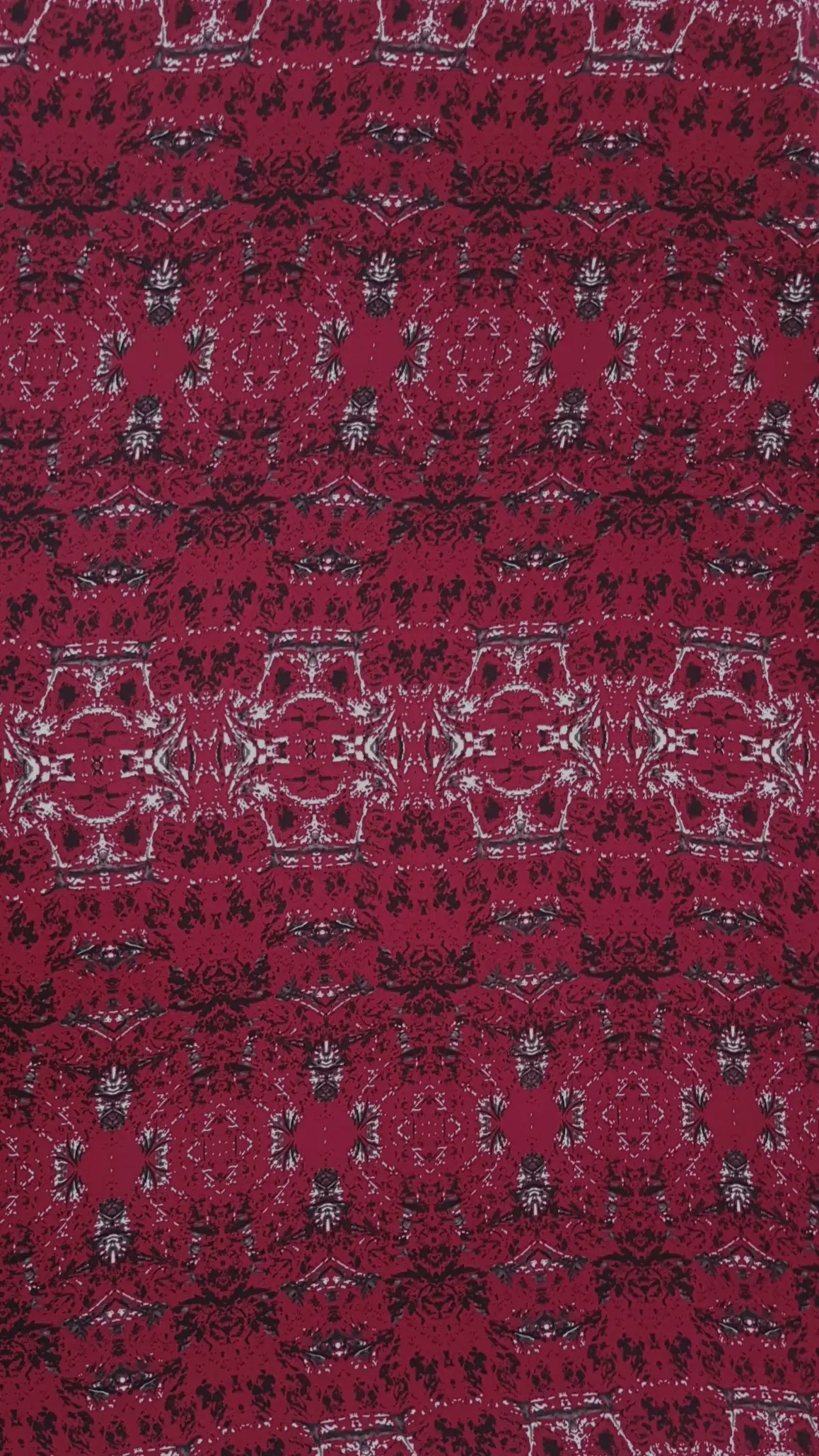 Geometric13 Collection in Red. Deep crimson-red ground overlaid with black mottling and chalky white distressed medallion shapes.